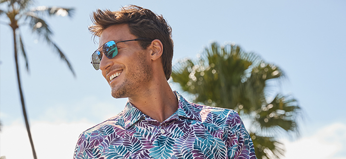 Man smiling wearing sunglasses