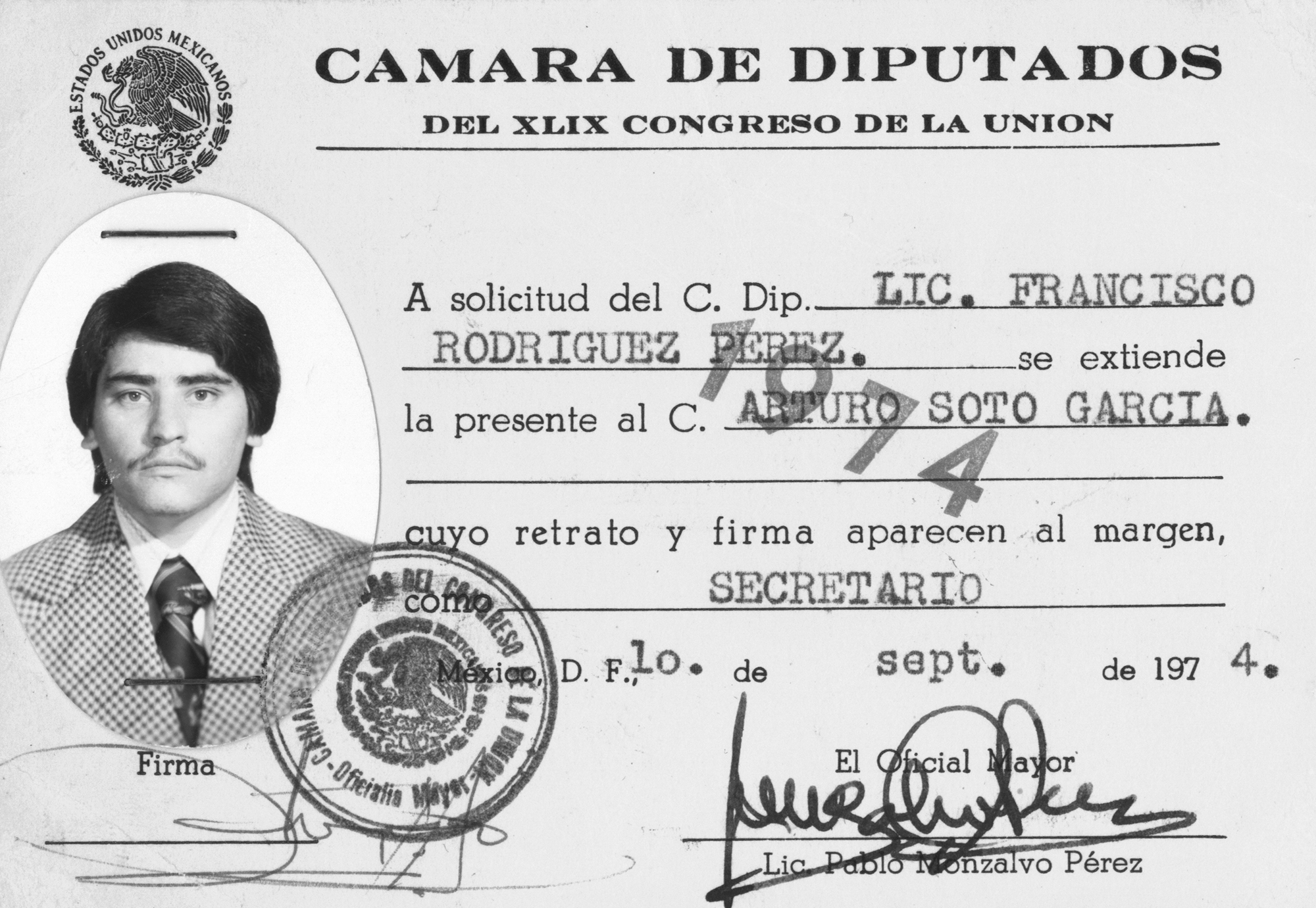 Mexican government ID card from 1974 showing man with moustache in suit and tie, with official seals and signatures on white paper.