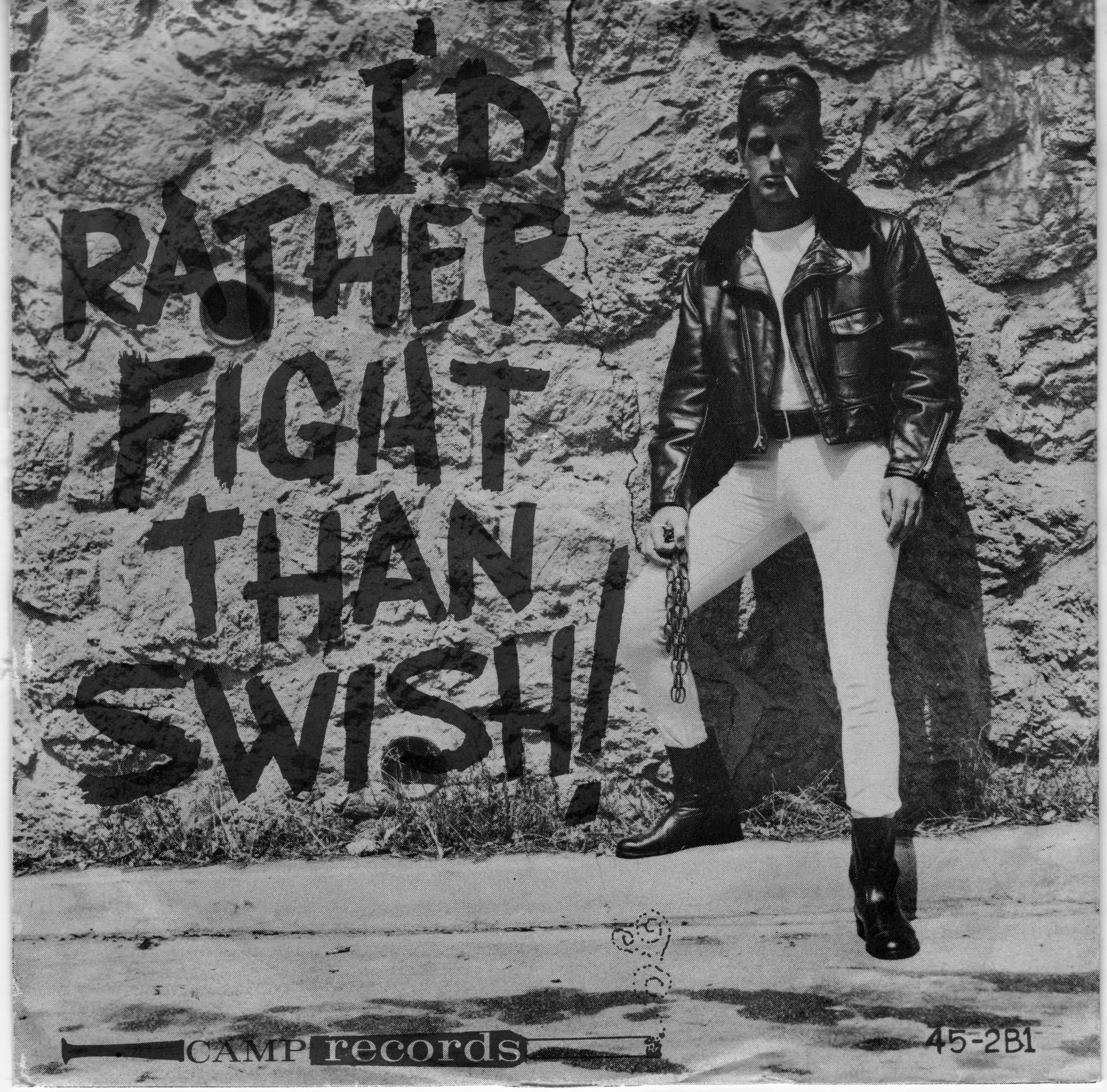 Black and white album cover showing person in leather jacket and light trousers against stone wall with "I'D RATHER FIGHT THAN SWITCH" text.