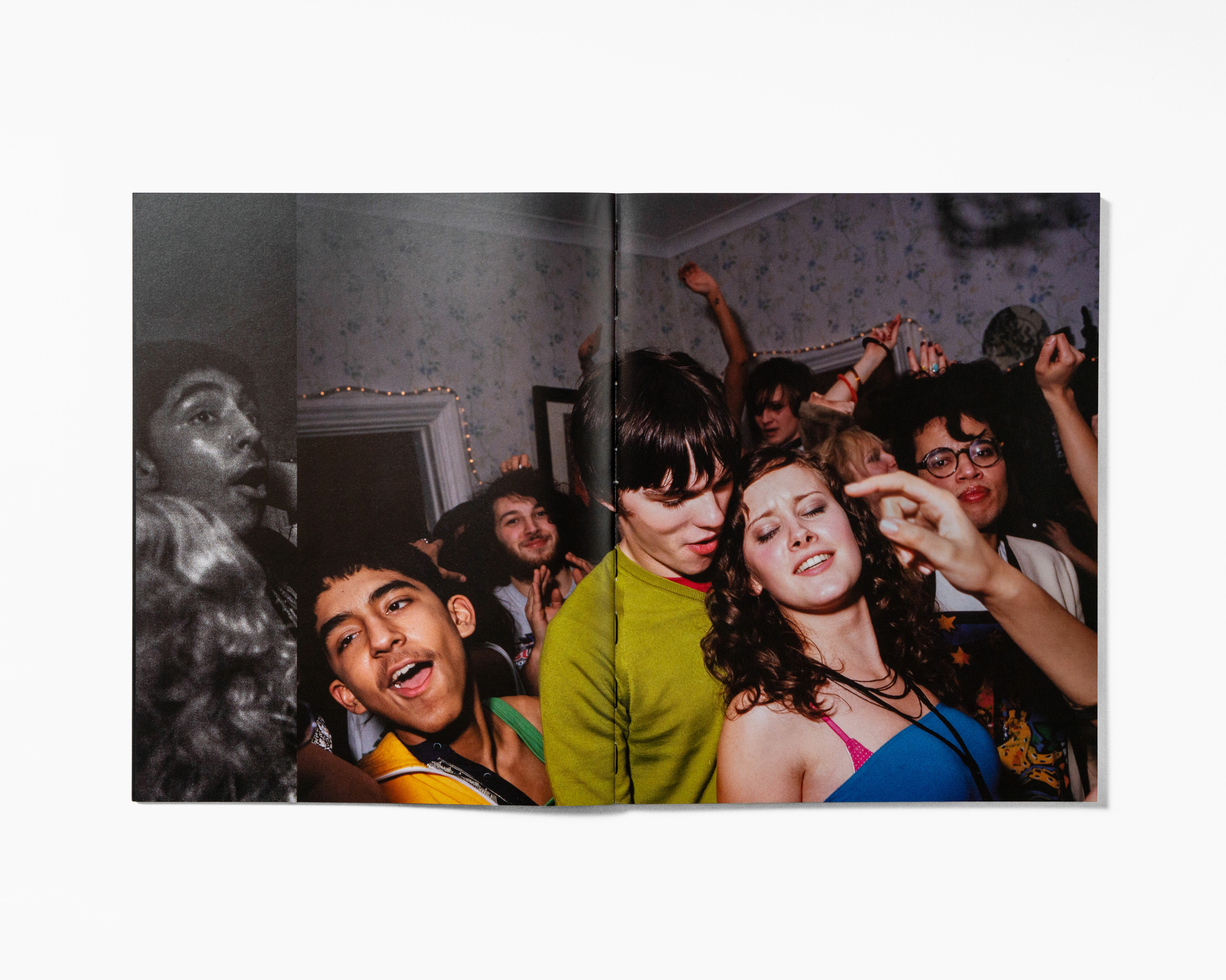 Lively group of young people enjoying a night out, with smiling and dancing figures.