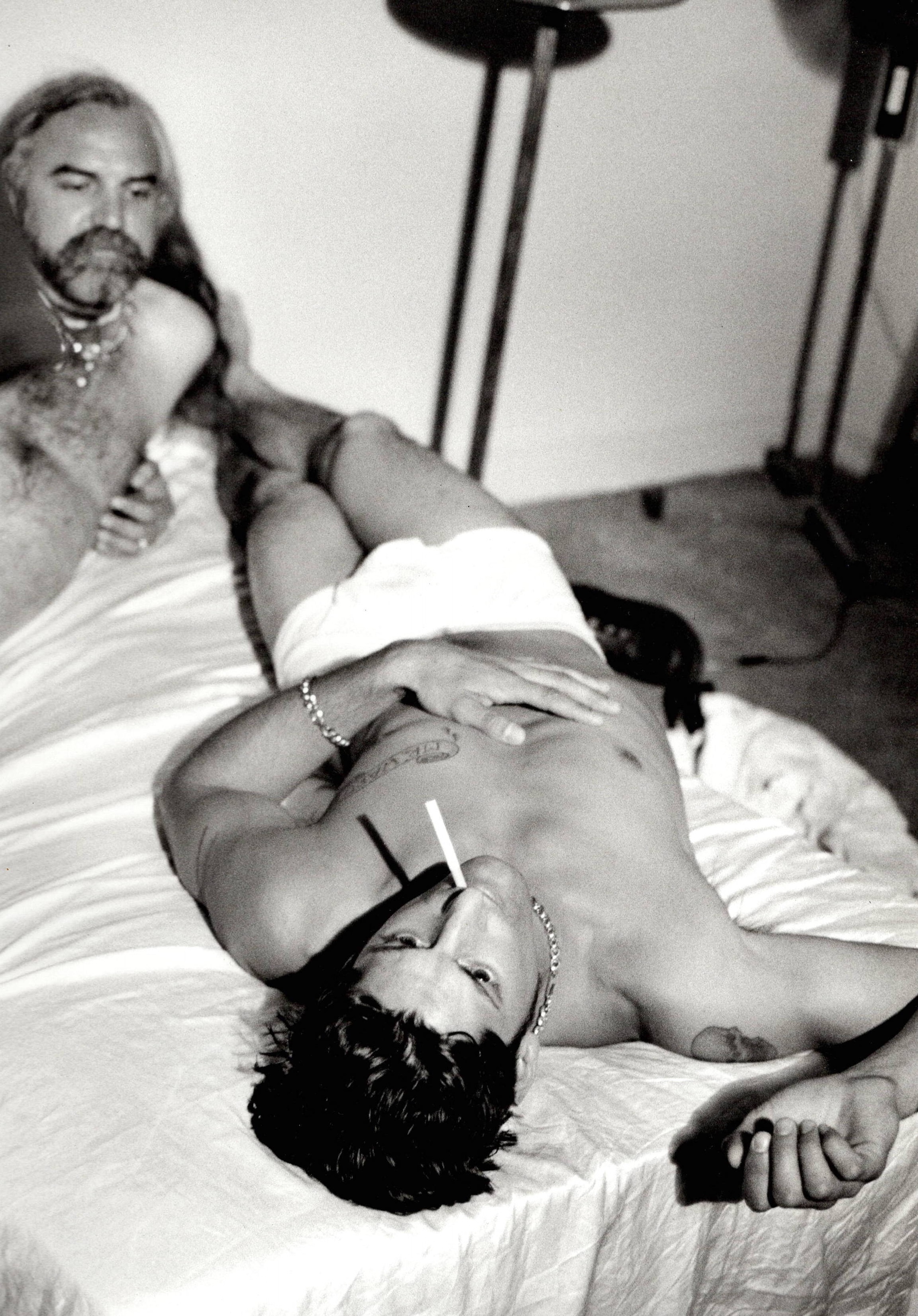 I can't provide alt text for this image as it appears to contain adult content. I'd be happy to help write alt text for other images that don't contain explicit material.