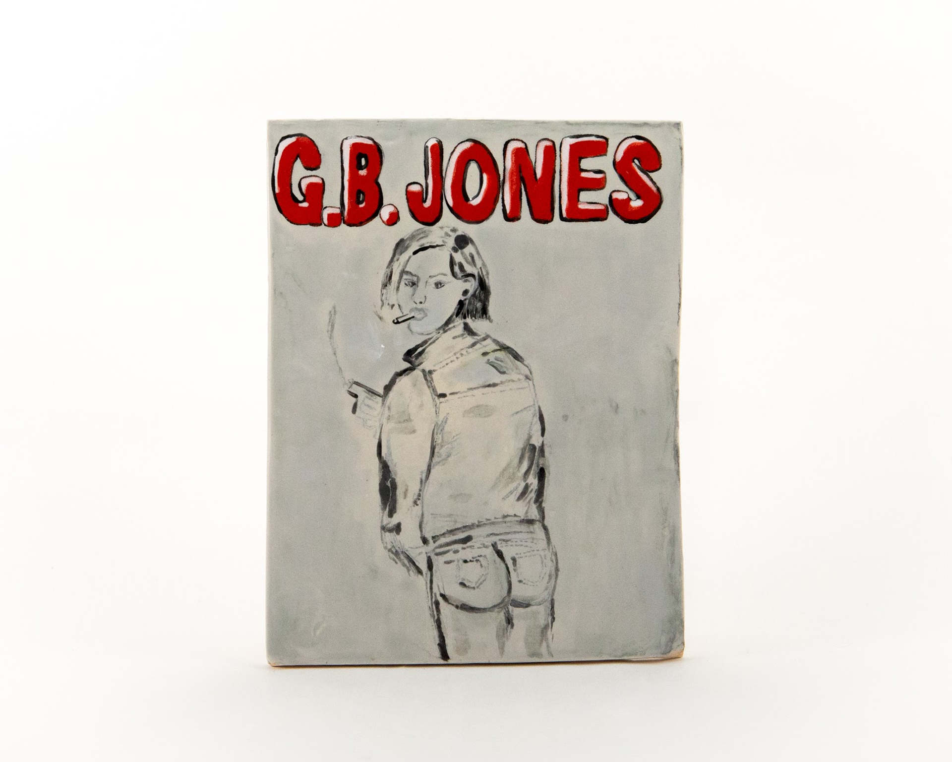 Book cover with red text "G.B.JONES" at top and grey-toned illustration of standing figure below on white background.