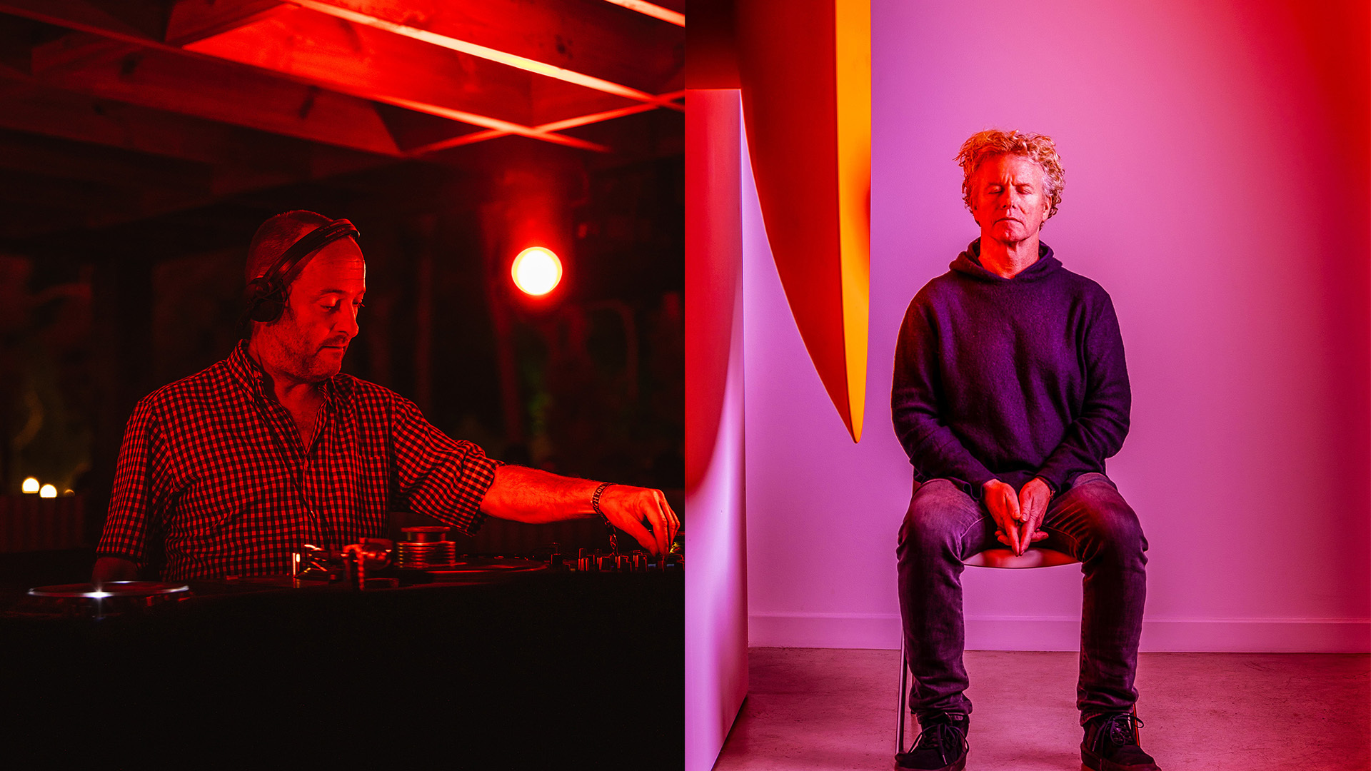 Two men in recording studio with red and pink lighting. One operates equipment at mixing desk, other sits on white cube wearing dark jumper.