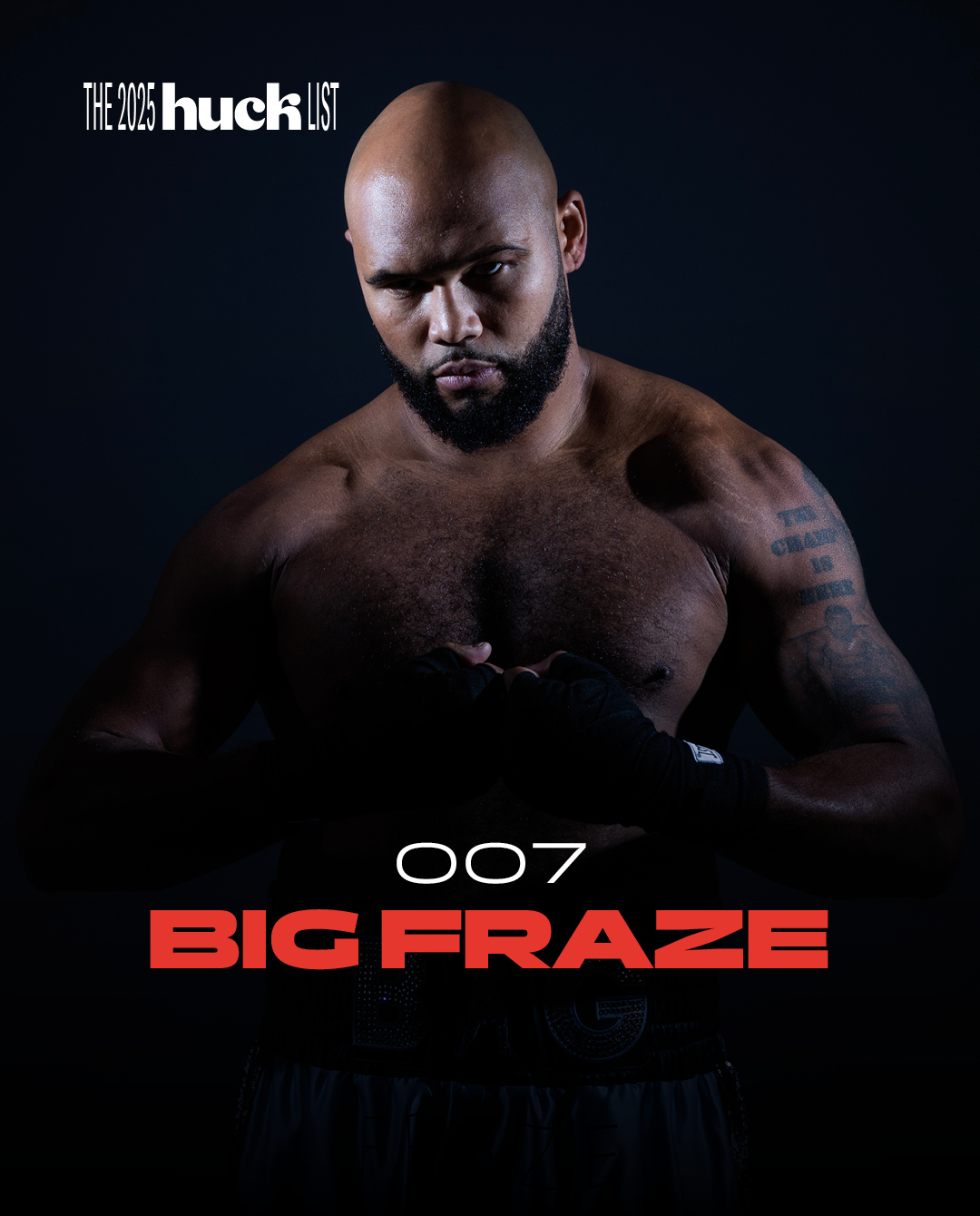 Heavily tattooed, bald, bearded man with serious expression against a dark background with the title "007 Big Fraze" and "The 2025 Huck List" text.