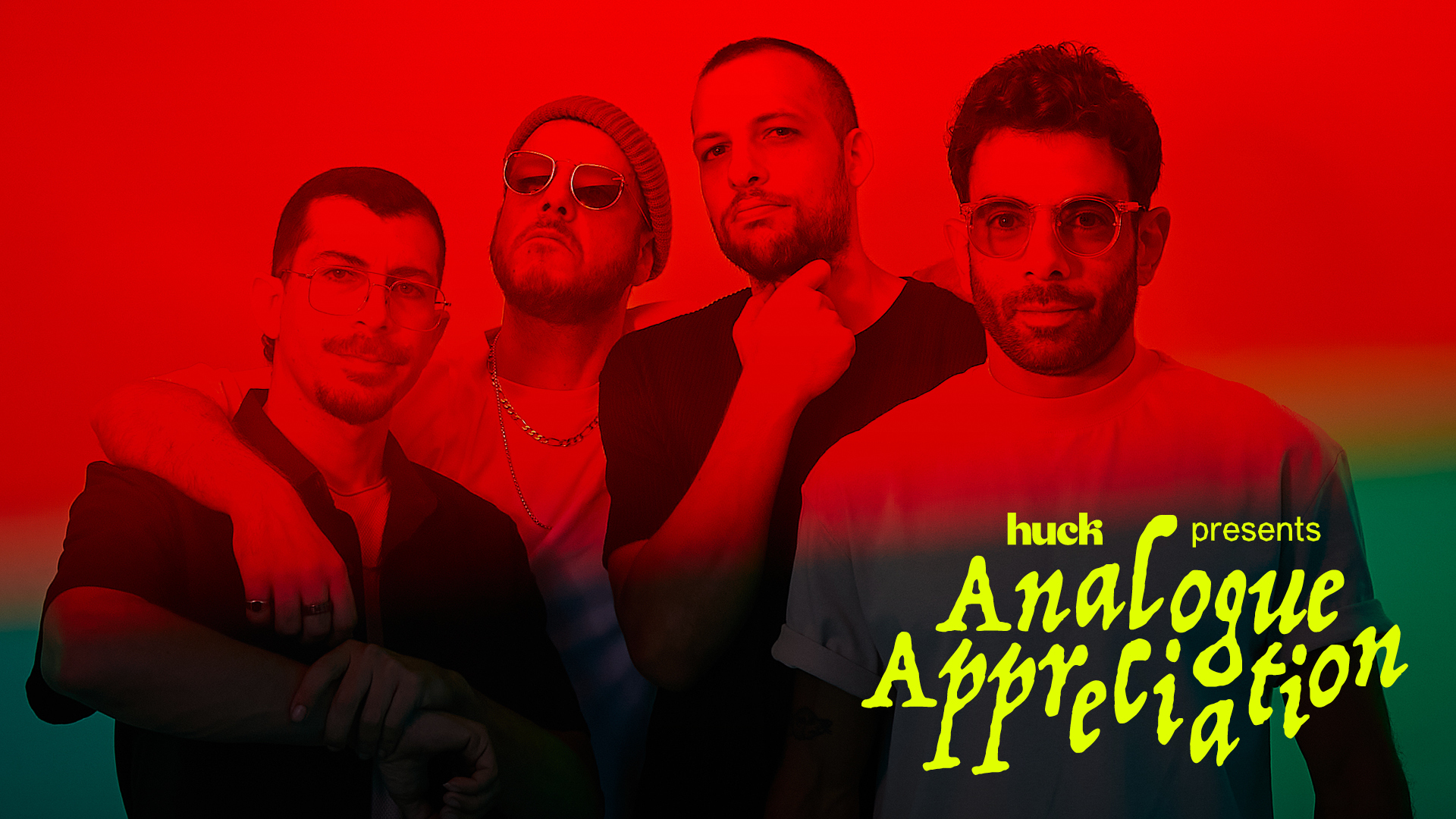 Four people posing for a portrait, wearing black outfits against a bright red background. The text "Hush presents Analogue Appreciation" is overlaid in yellow and green lettering.