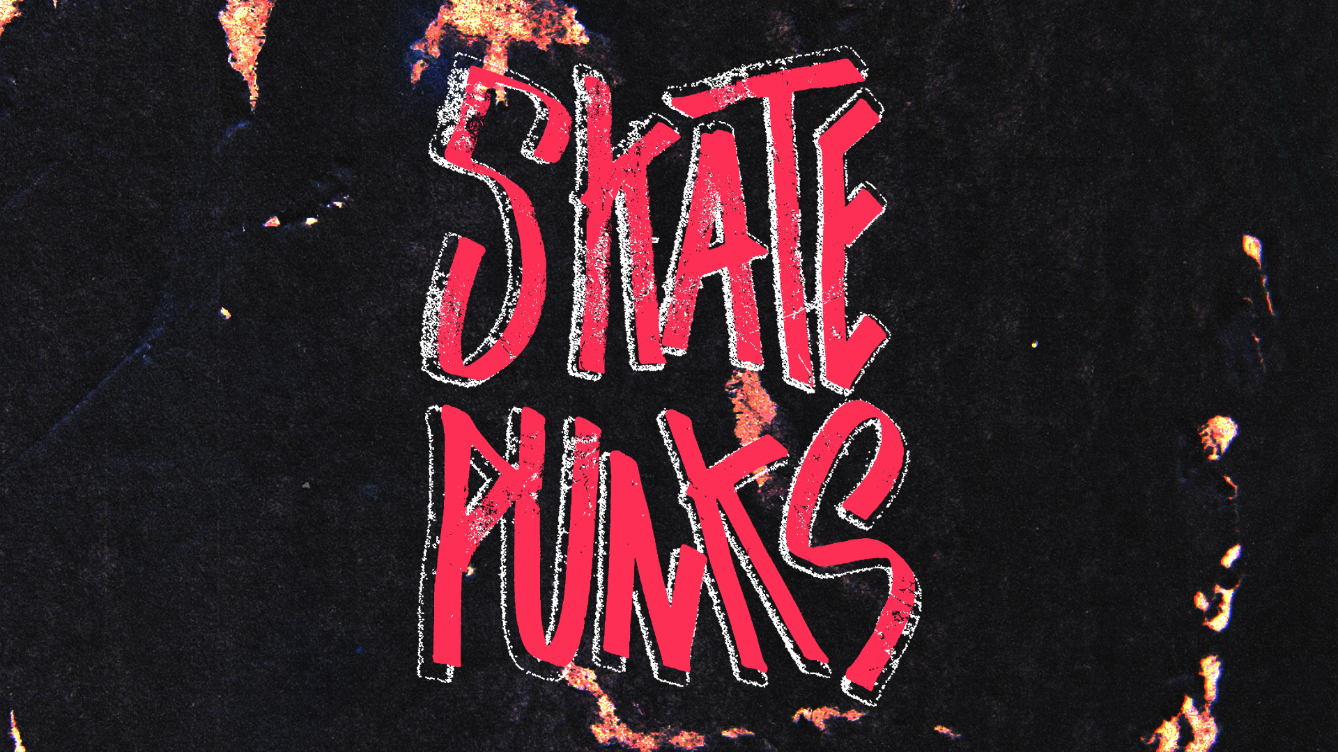Bold red text reading "SKATE PUNKS" in graffiti-style lettering on weathered black surface with brown rust patches and scratches.