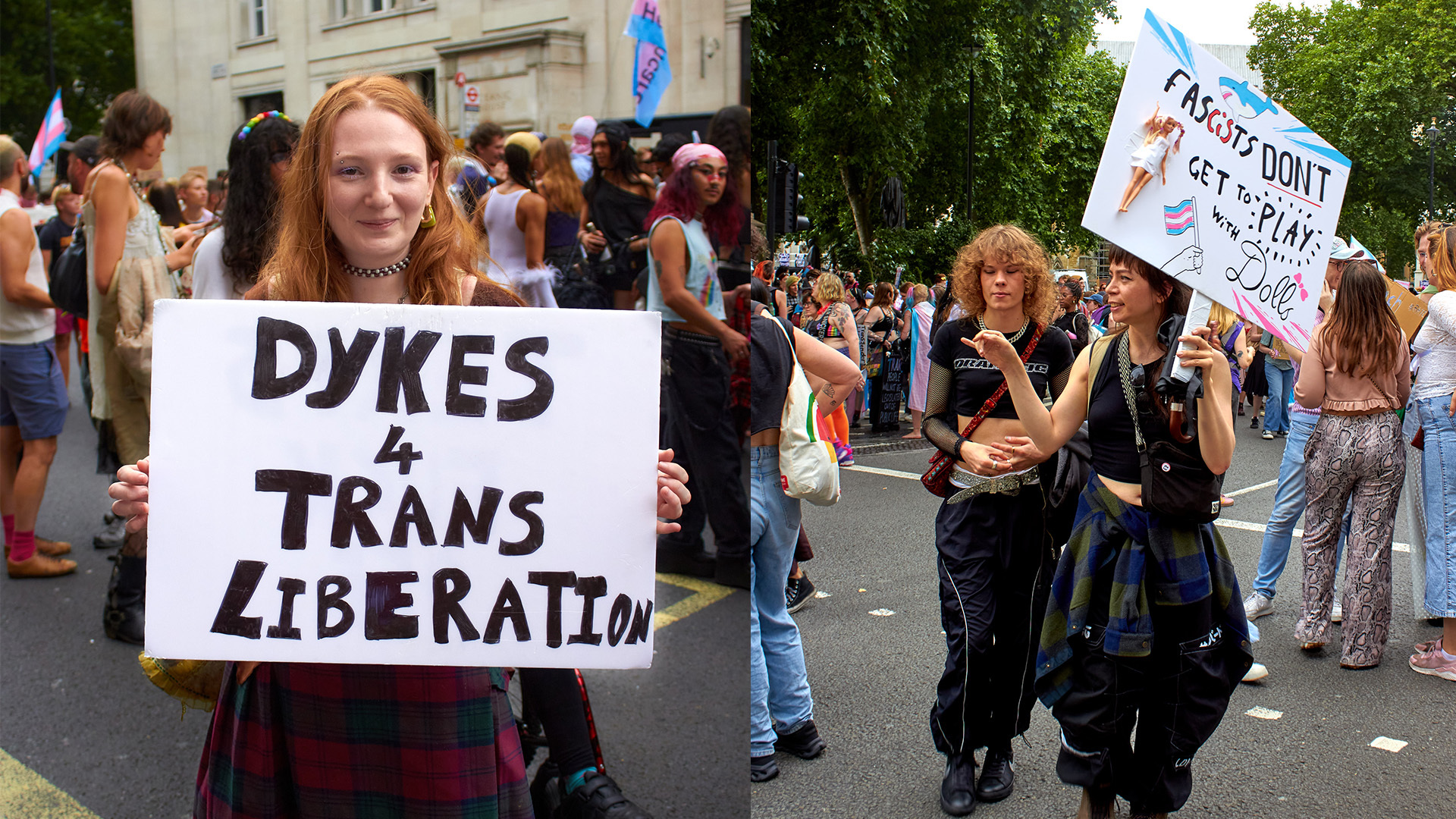 Woman with long red hair holds white sign reading "DYKES 4 TRANS LIBERATION" at crowded street protest with other demonstrators and banners.