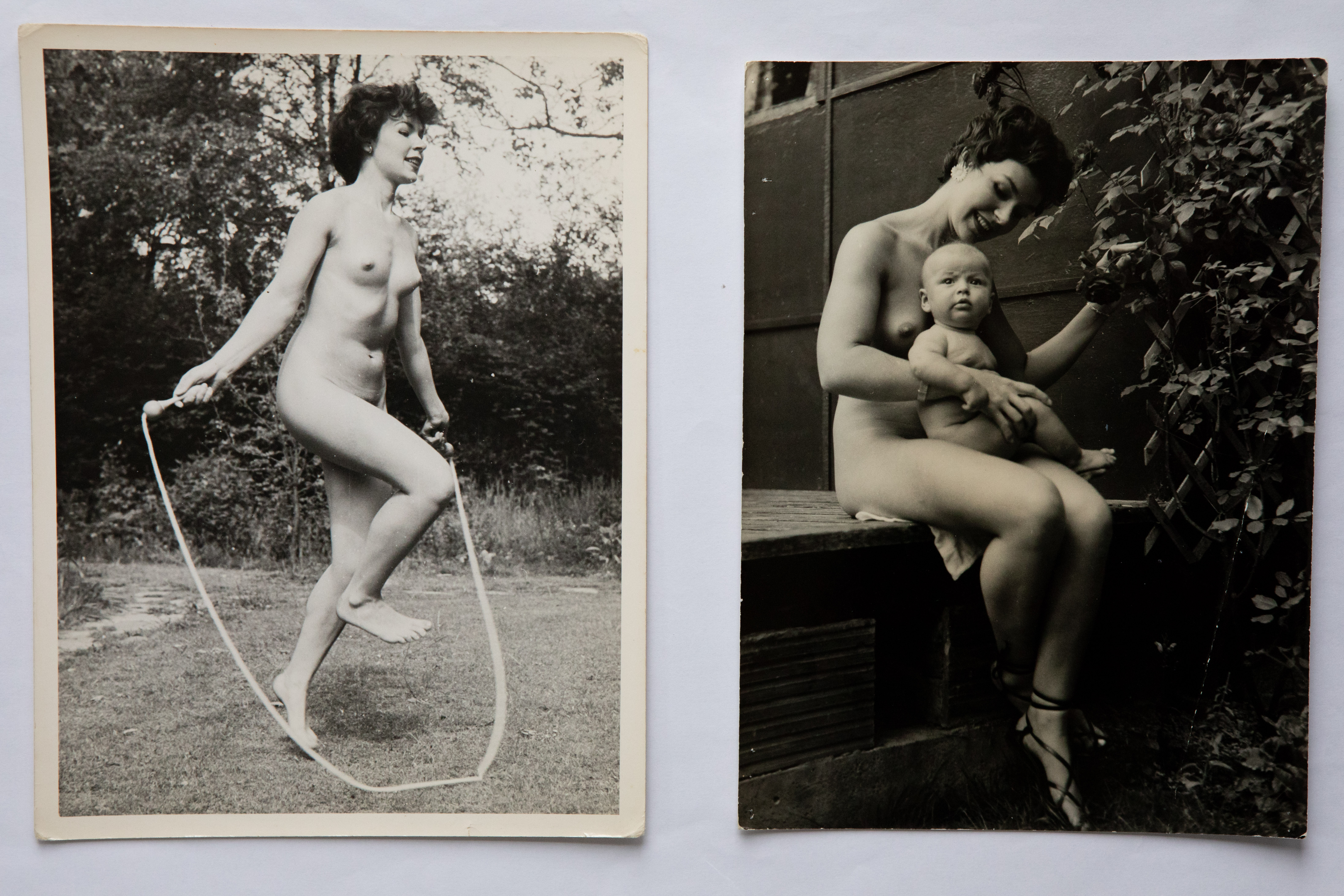 Two vintage black and white photographs: left shows nude woman with skipping rope outdoors, right shows nude woman holding baby.