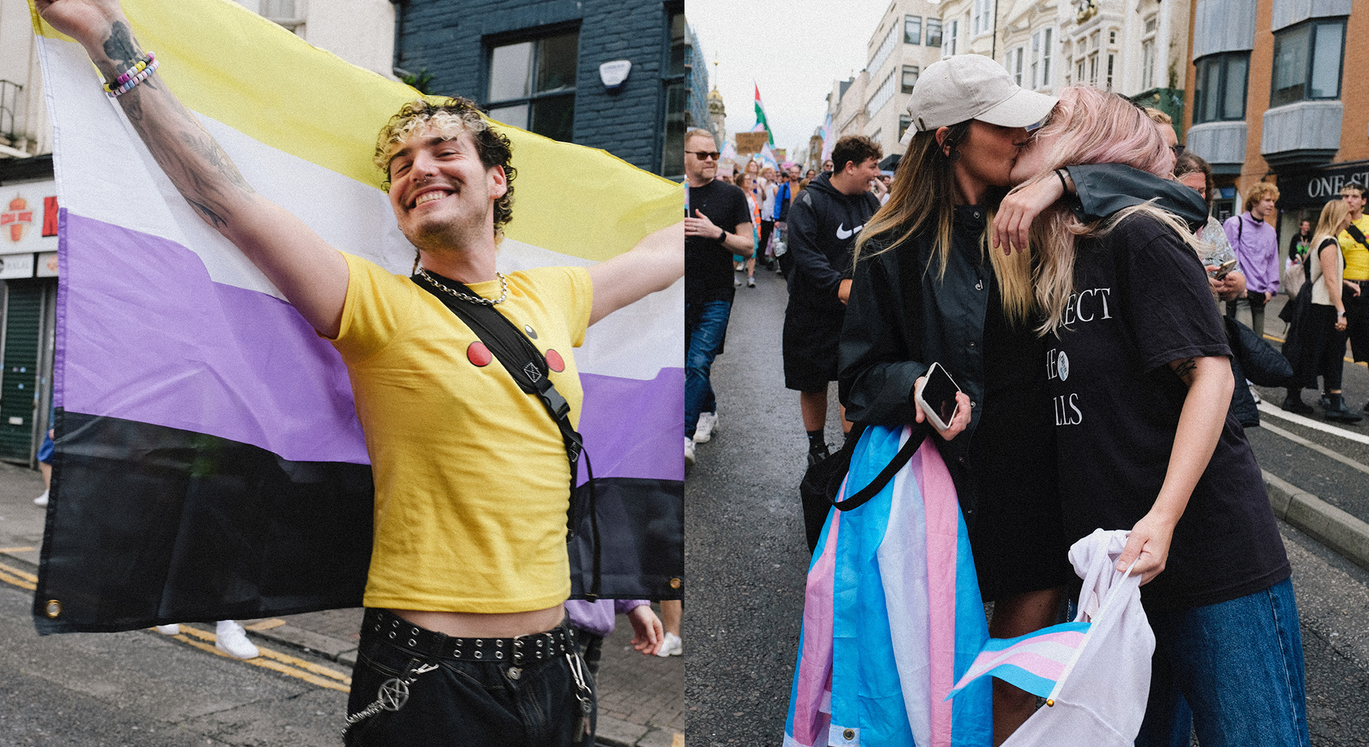 Two people at street demonstration: person in yellow holding non-binary pride flag, person in black hoodie with transgender pride flag.