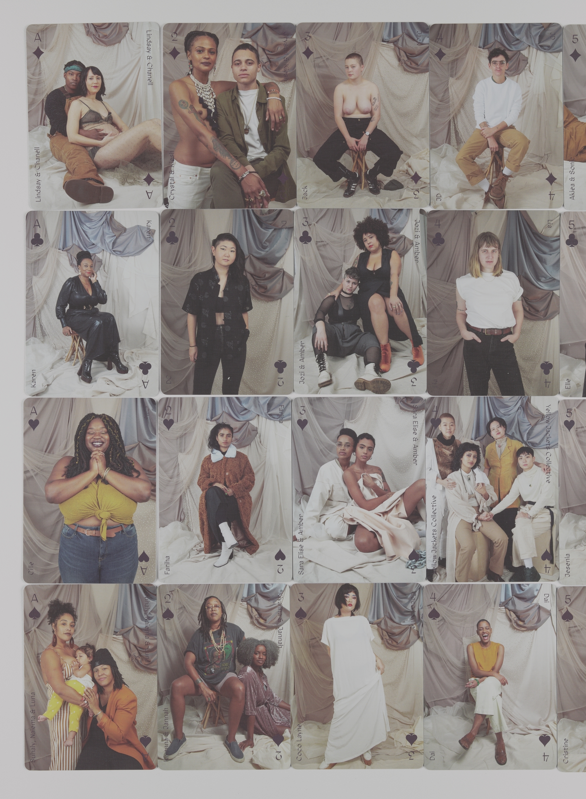 Grid of 18 portraits featuring diverse people, dressed in various fashions and poses, in front of ornate curtain backdrops in neutral tones.