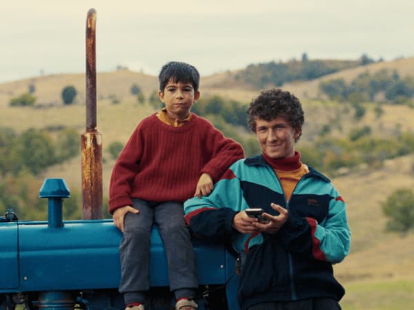 Naim (Agush Agashev) and big brother Ahmet (Arif Jaqup)