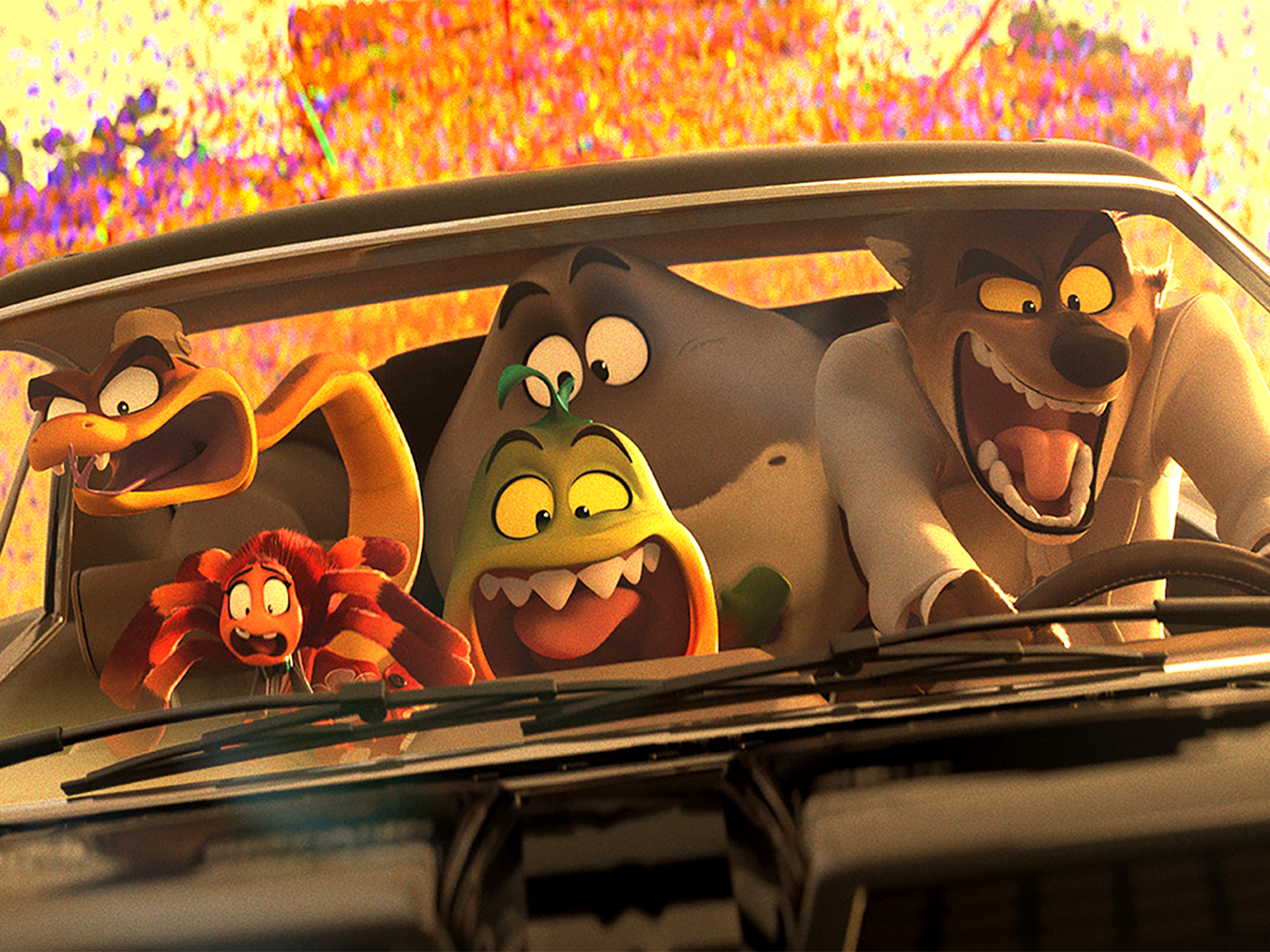 Animated characters in car: red creature, yellow snake-like figure, and brown wolf-like character. Warm yellow-orange background.