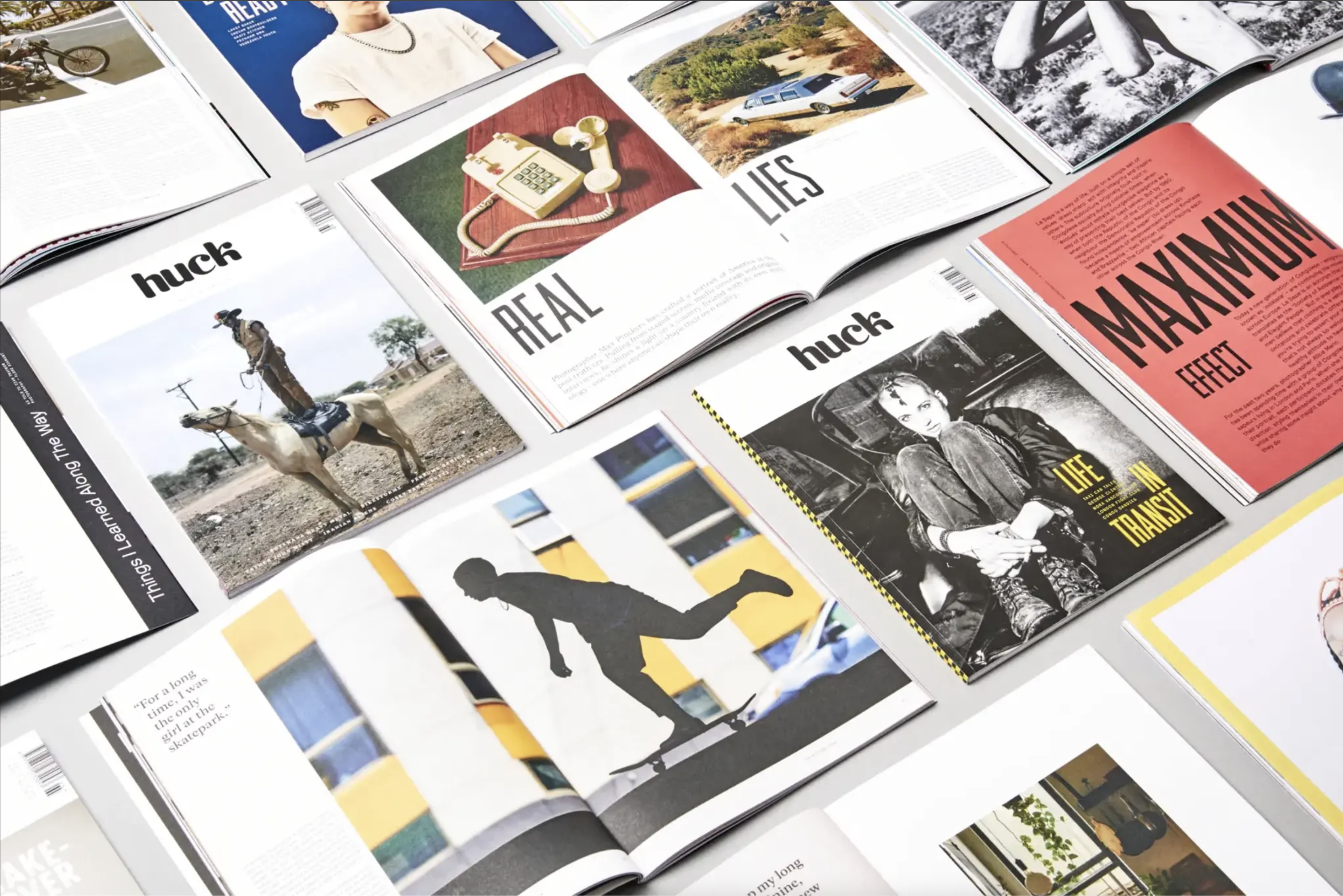 Multiple magazine issues spread out showing covers and pages with varied layouts, typography, and imagery including photographs and illustrations.