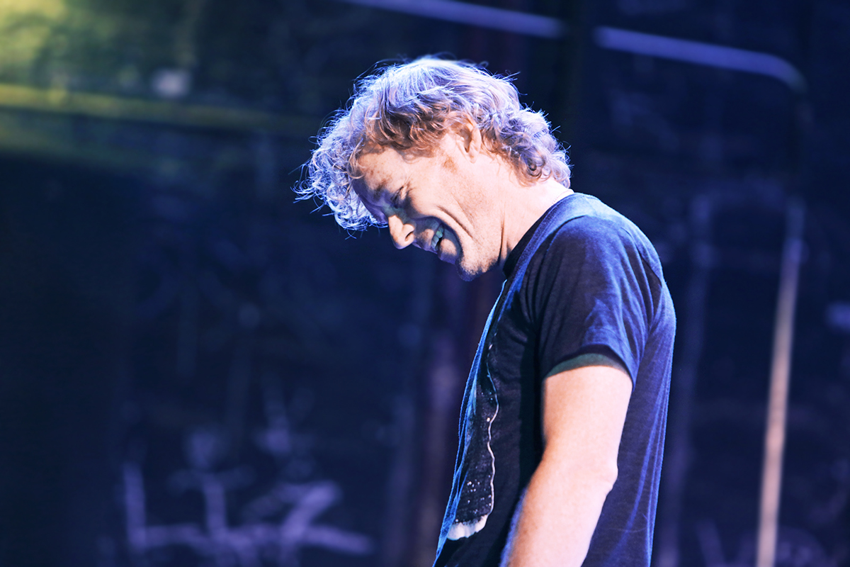 Line of the Best Fit Alan smiling during set up while Neil Youngs On the Beach was playing in the background