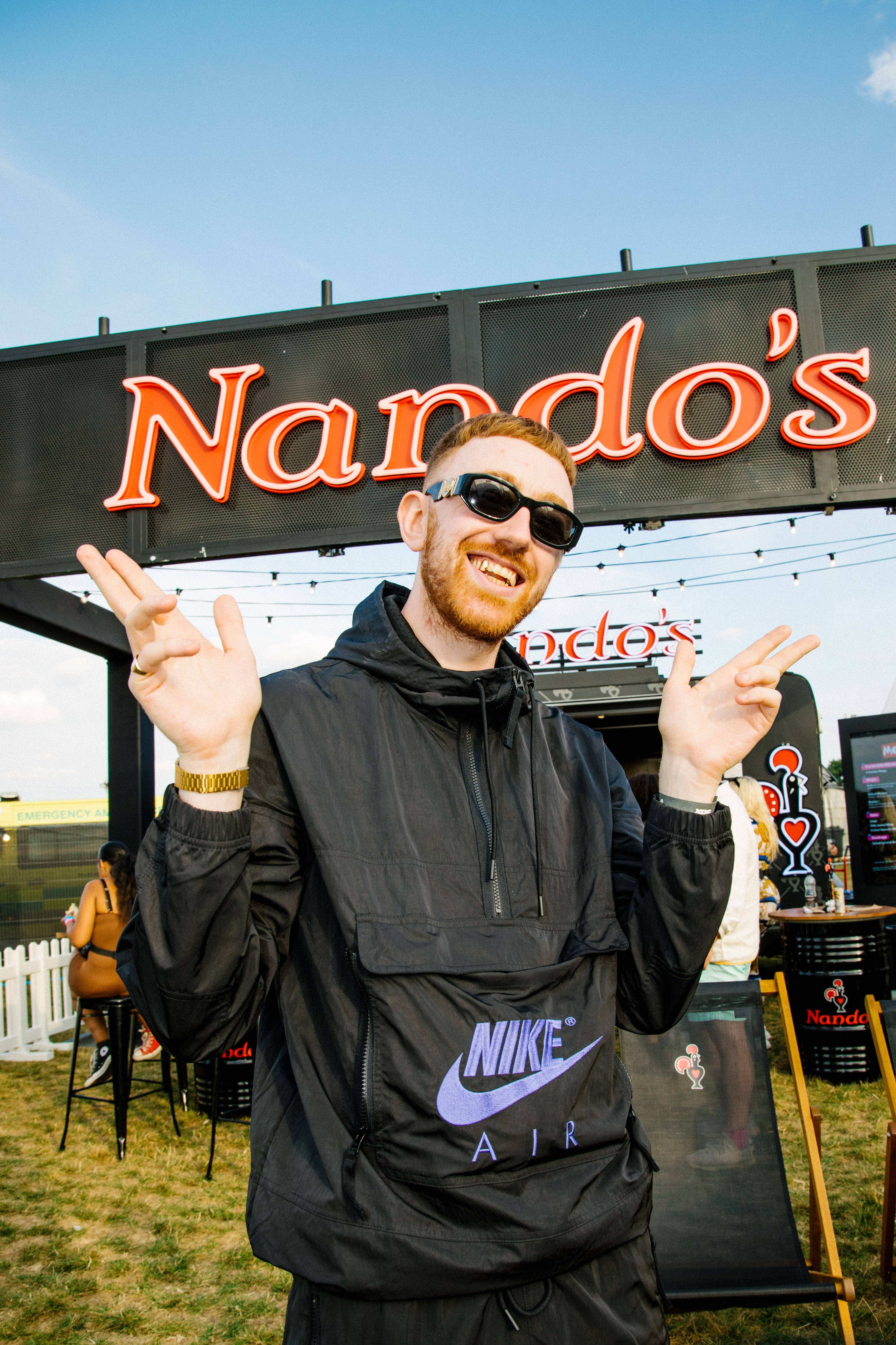 Dublin rapper Mango caught posing with Nandos backstage on Day One of Strawberries and Creem Festival