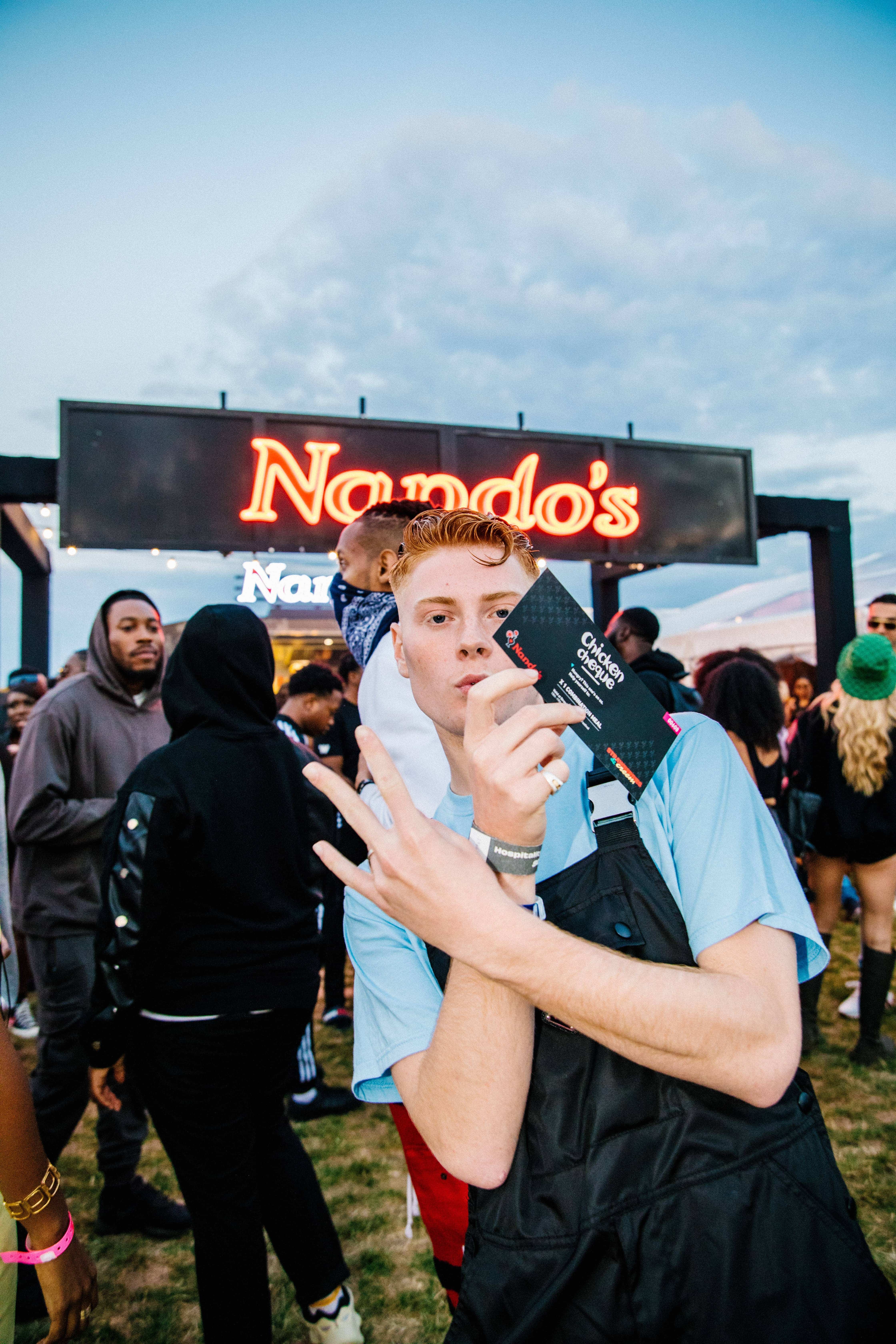 Fashions finest Gully Guy Leo caught queueing for a Nandos in between the festival action at Day One of Strawberries and Creem