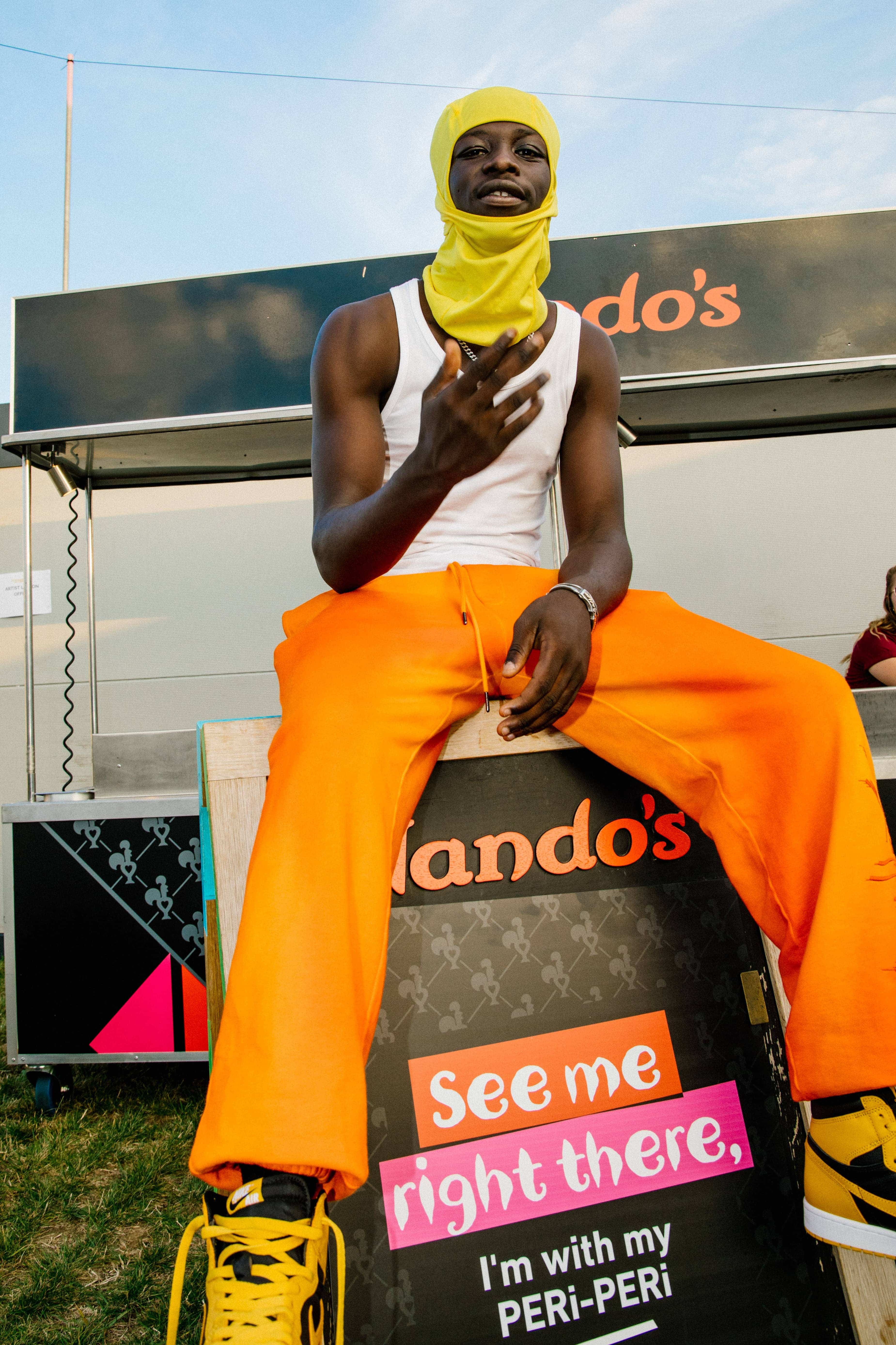 Pa Salieu snapped backstage at Strawberries and Creem Festival with a PE Ri PE Ri nod to his mainstage performance on Day One jpg