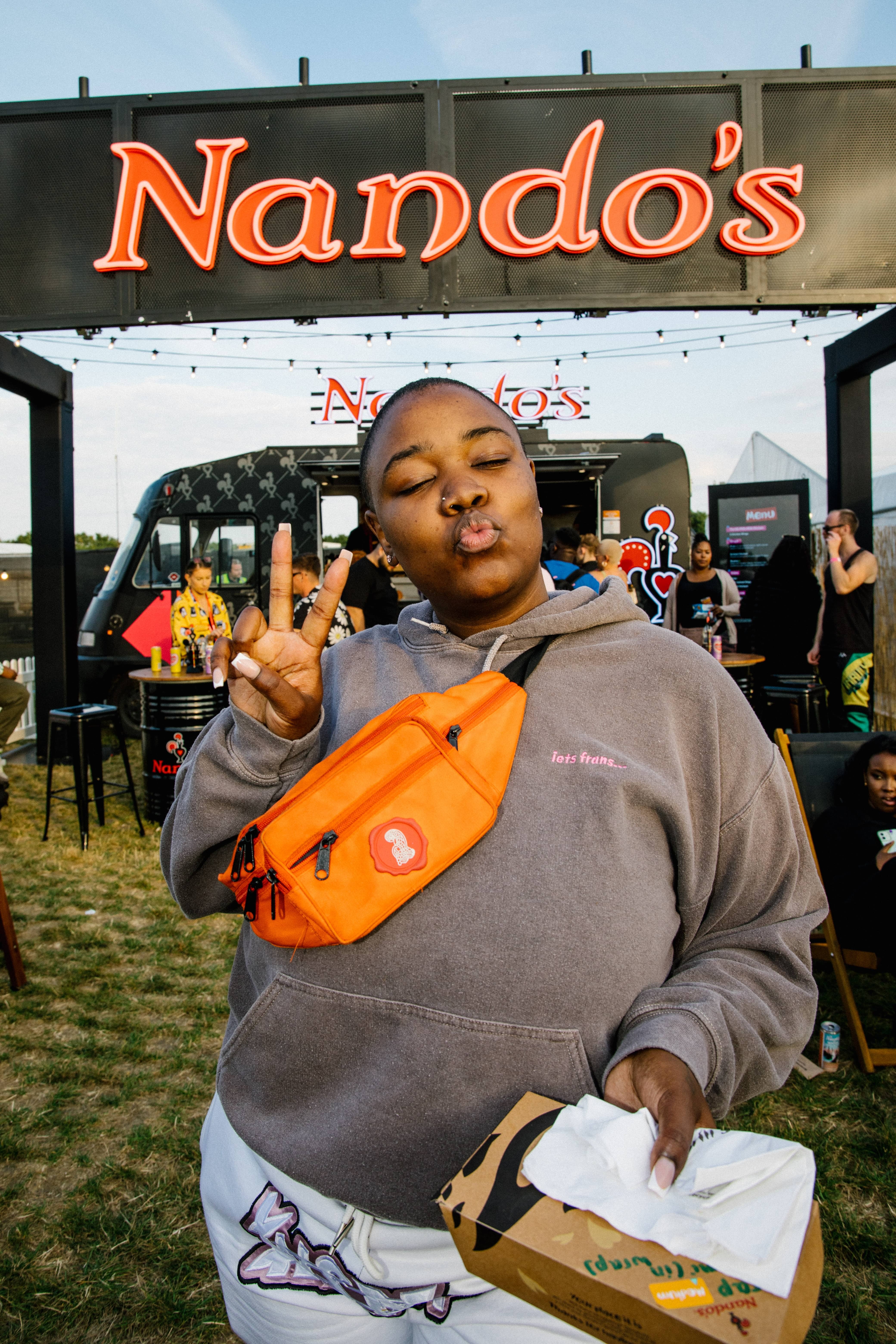 Singer songwriter Hamzaa backstage on Day One at Strawberries and Creem Festival caught re fuelling on some Nandos PE Ri PE Ri between the festivities