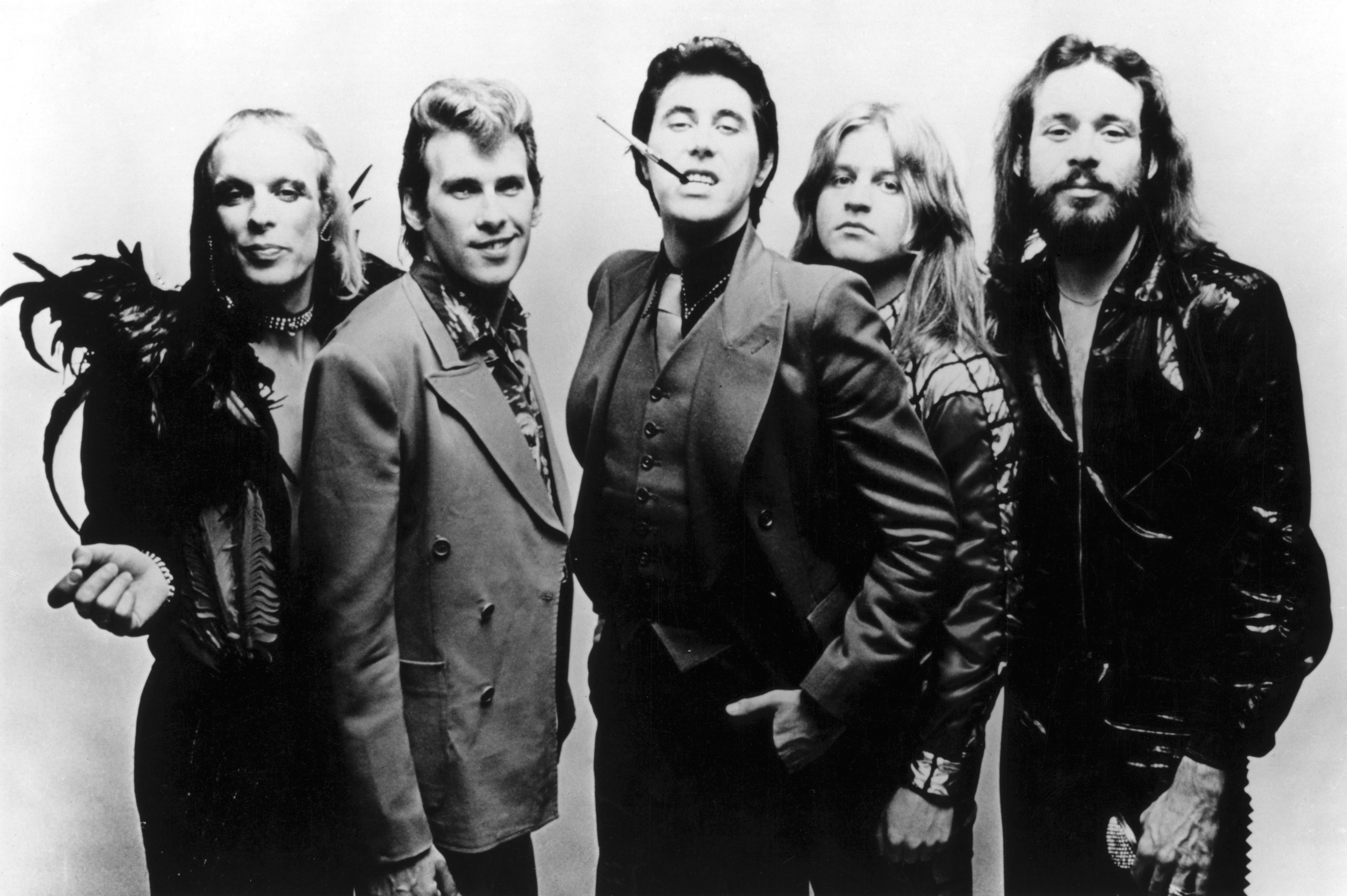 1973 RM BE AM BF PT PM Group posed photo II Eno in feathers BF with filter cigarette poss Amsterdam by Claude Van Heye 5698x3791