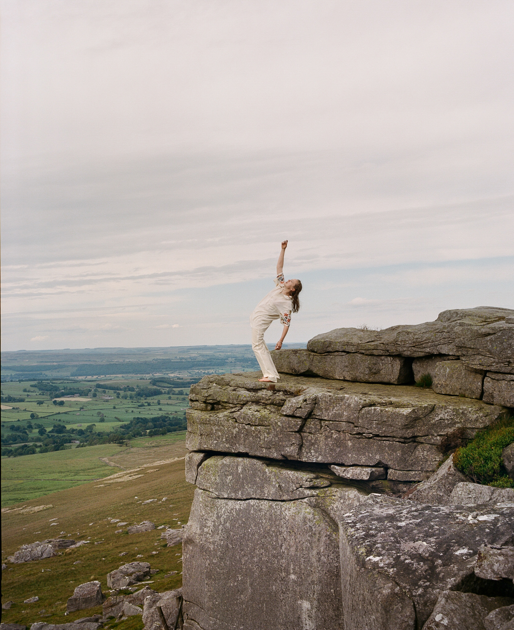 Anna B Savage on a cliff edge