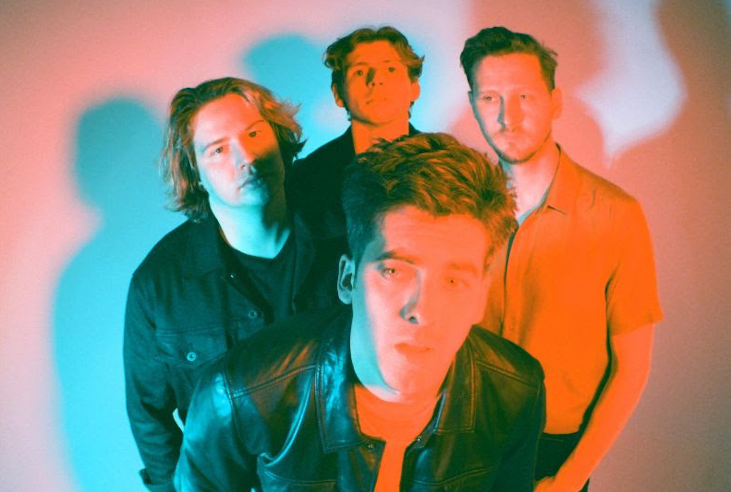 Circa Waves group shot red blue lighting