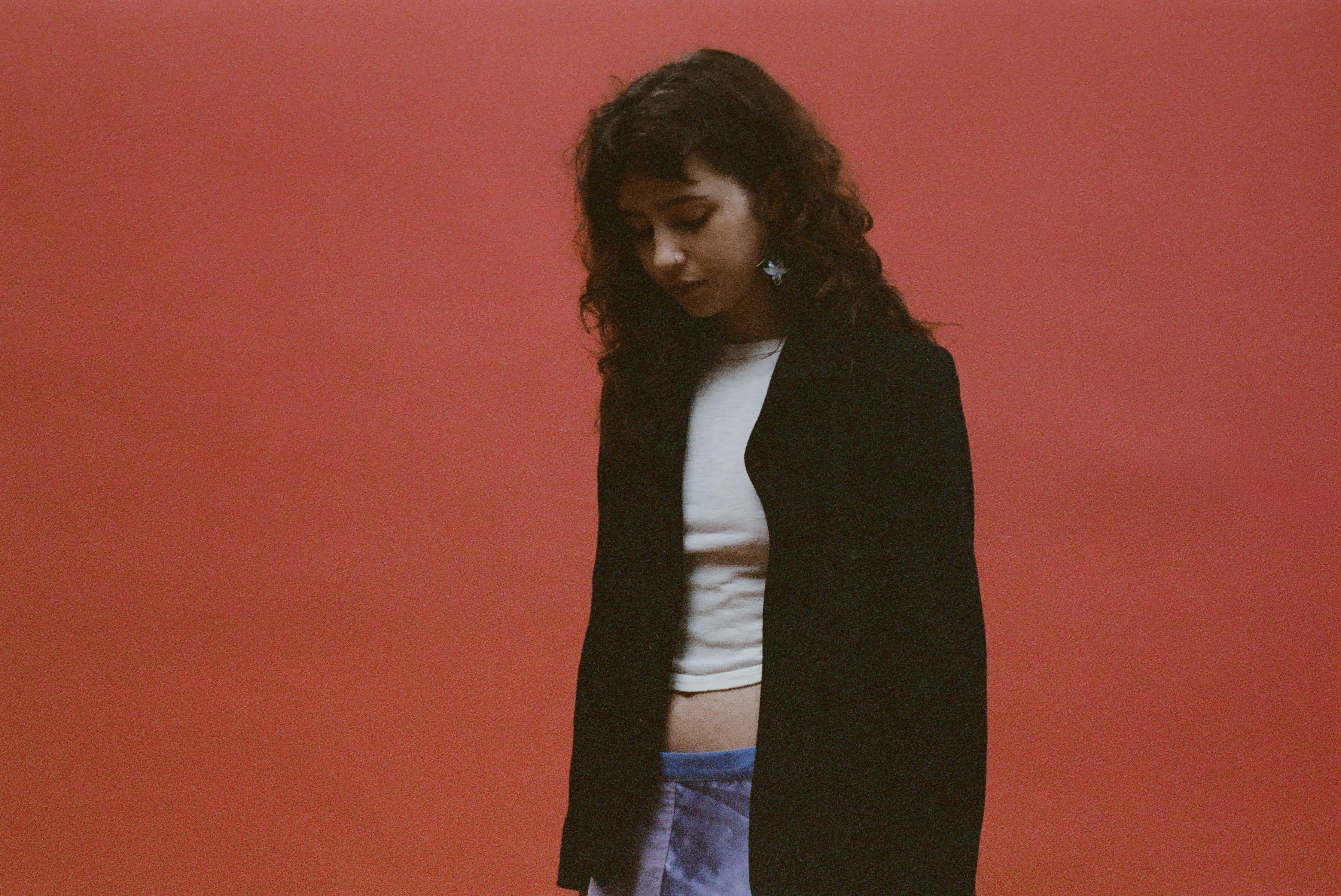 Clairo red background