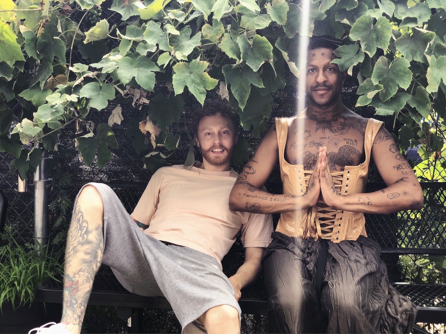 Falty DL Mykki Blanco sitting on bench