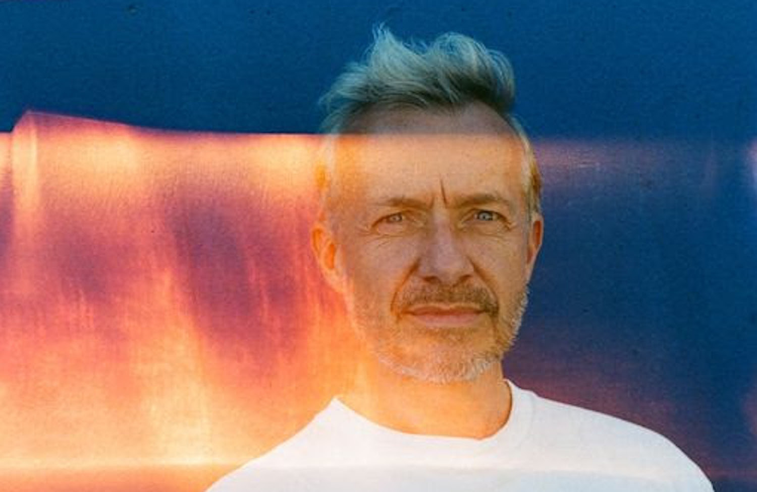 Fraser T Smith orange light leak blue backdrop