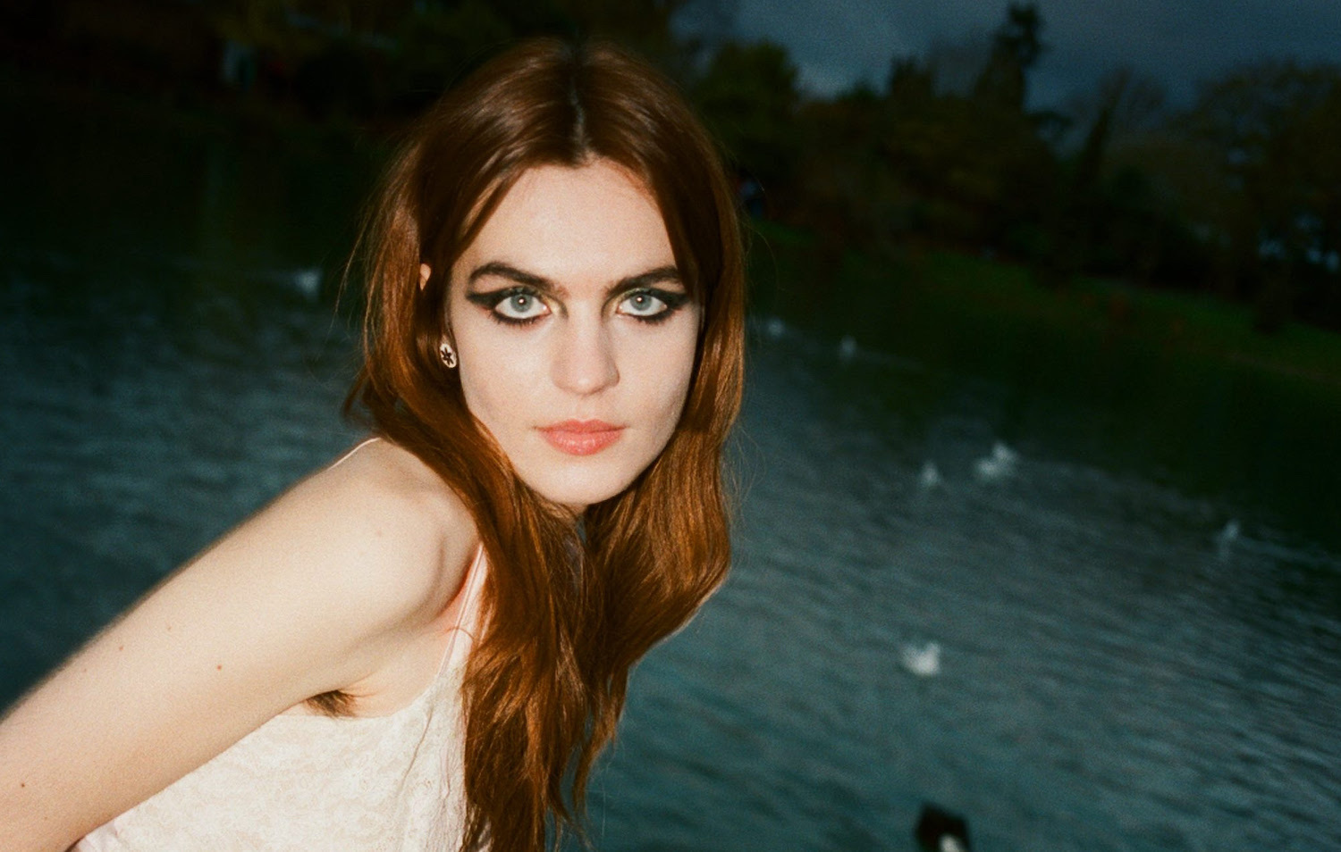 Gretel Hanlyn dress next to lake