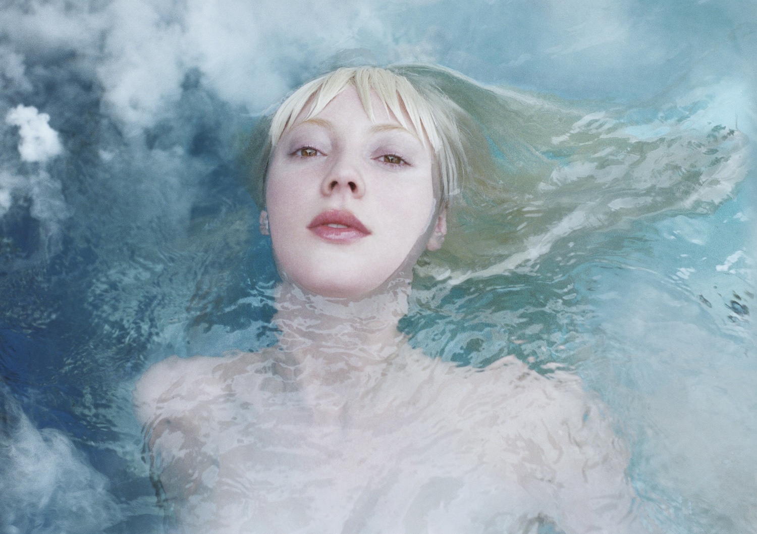 Hyd submerged in water with head tilted back for CLEARING album cover