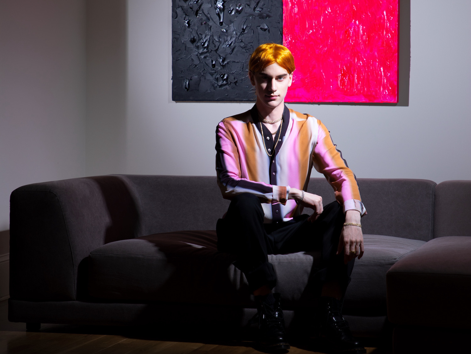 Jimmy Edgar sat on sofa in striped shirt 2022