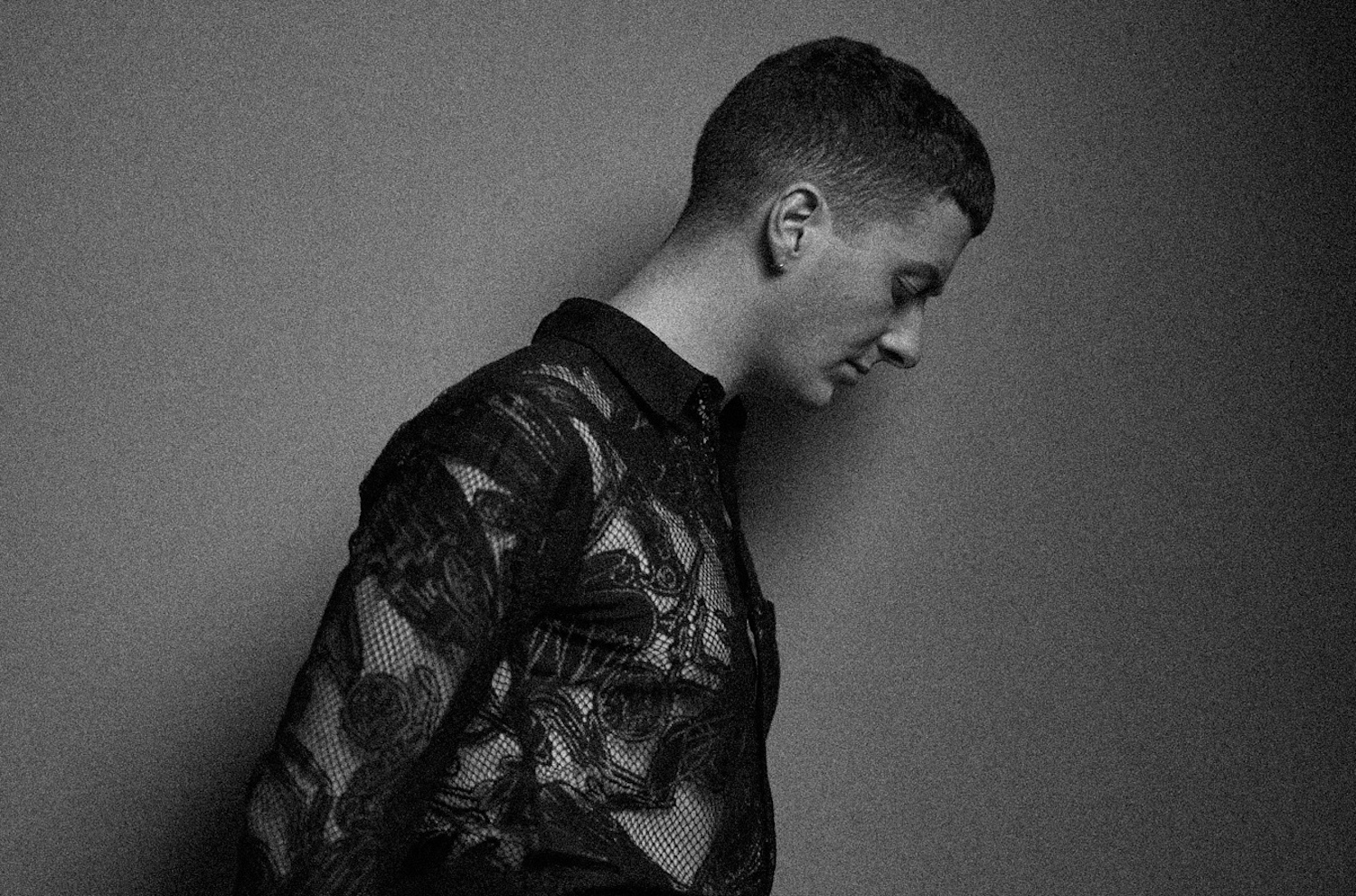 Joesef looking down lace shirt monochrome Martin