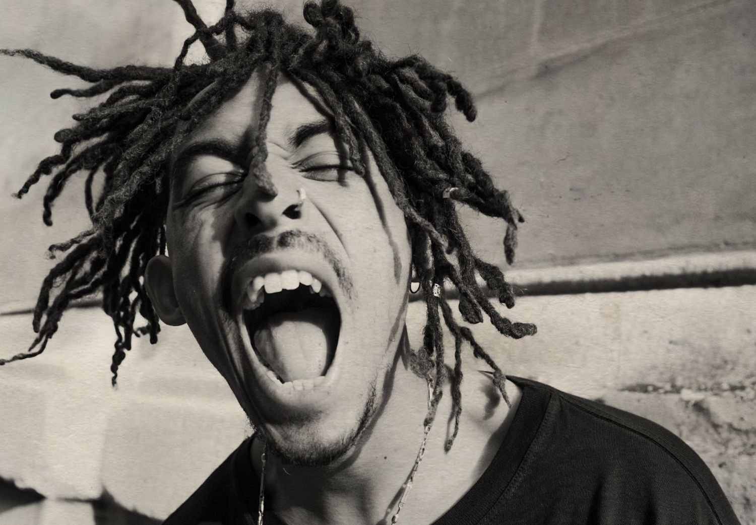 Jordan Stephens screaming monochrome