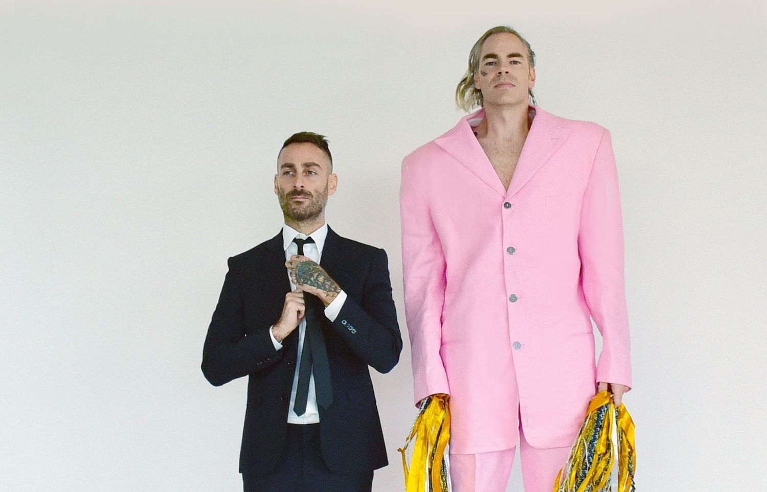 LIES pink suit jump pom poms