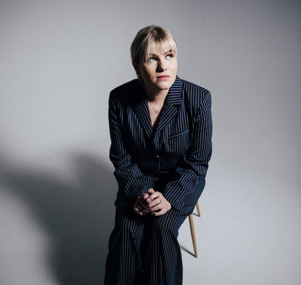 Maddie Zahm pinstripe suit 2023