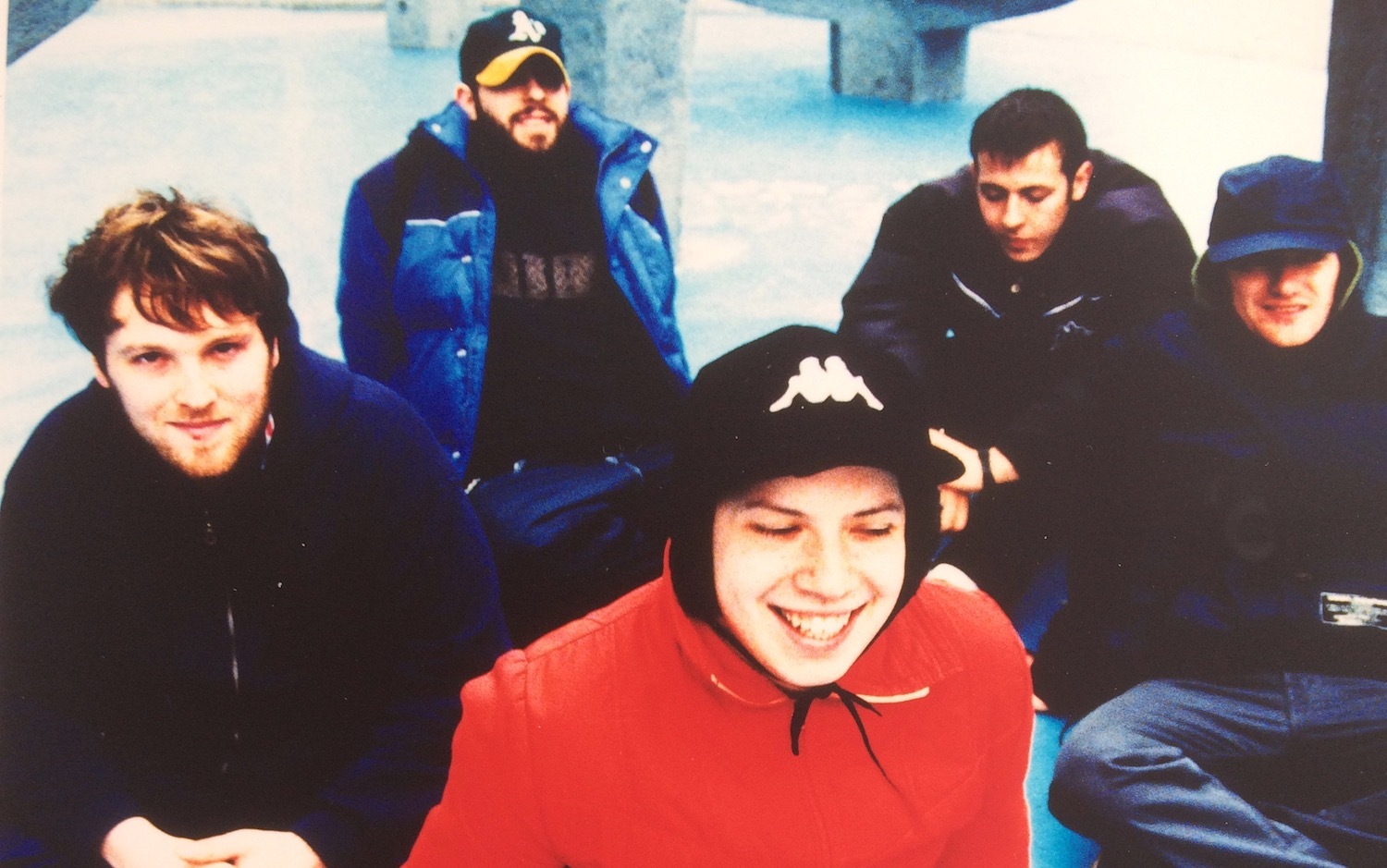 Mogwai sitting down group shot taken in 1999