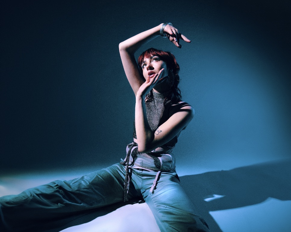 Molly Burman blue backdrop 2023