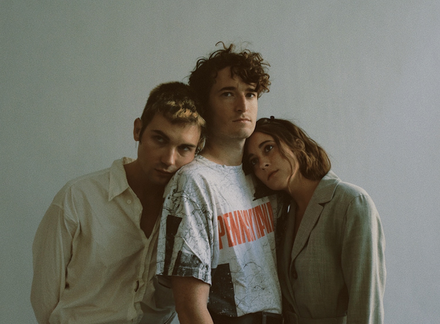 Nation of Language leaning on each other