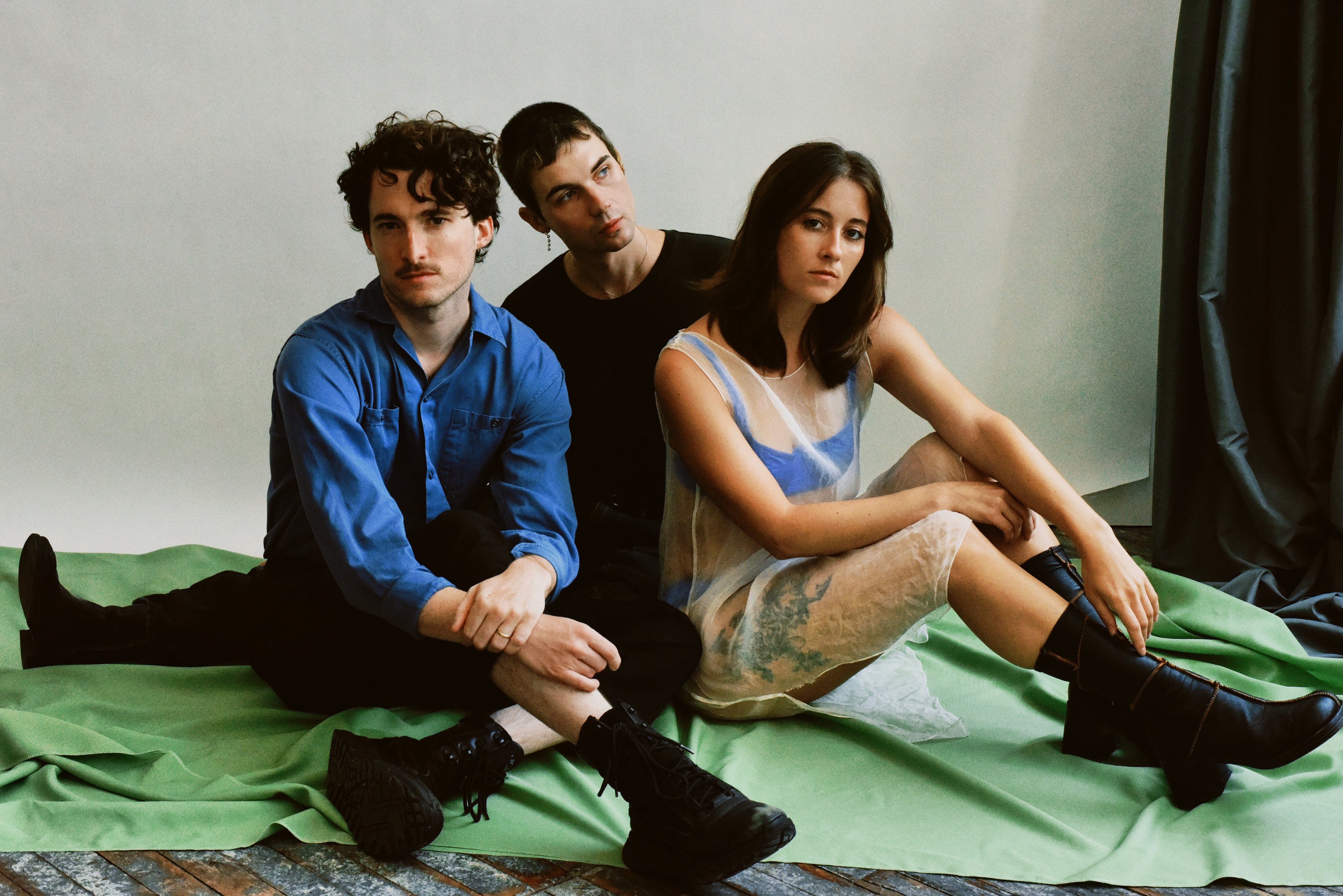 Nation of Language sat on floor 2023