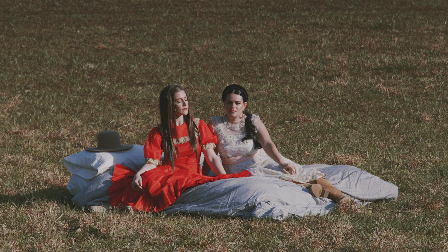 Overcoats bed in field