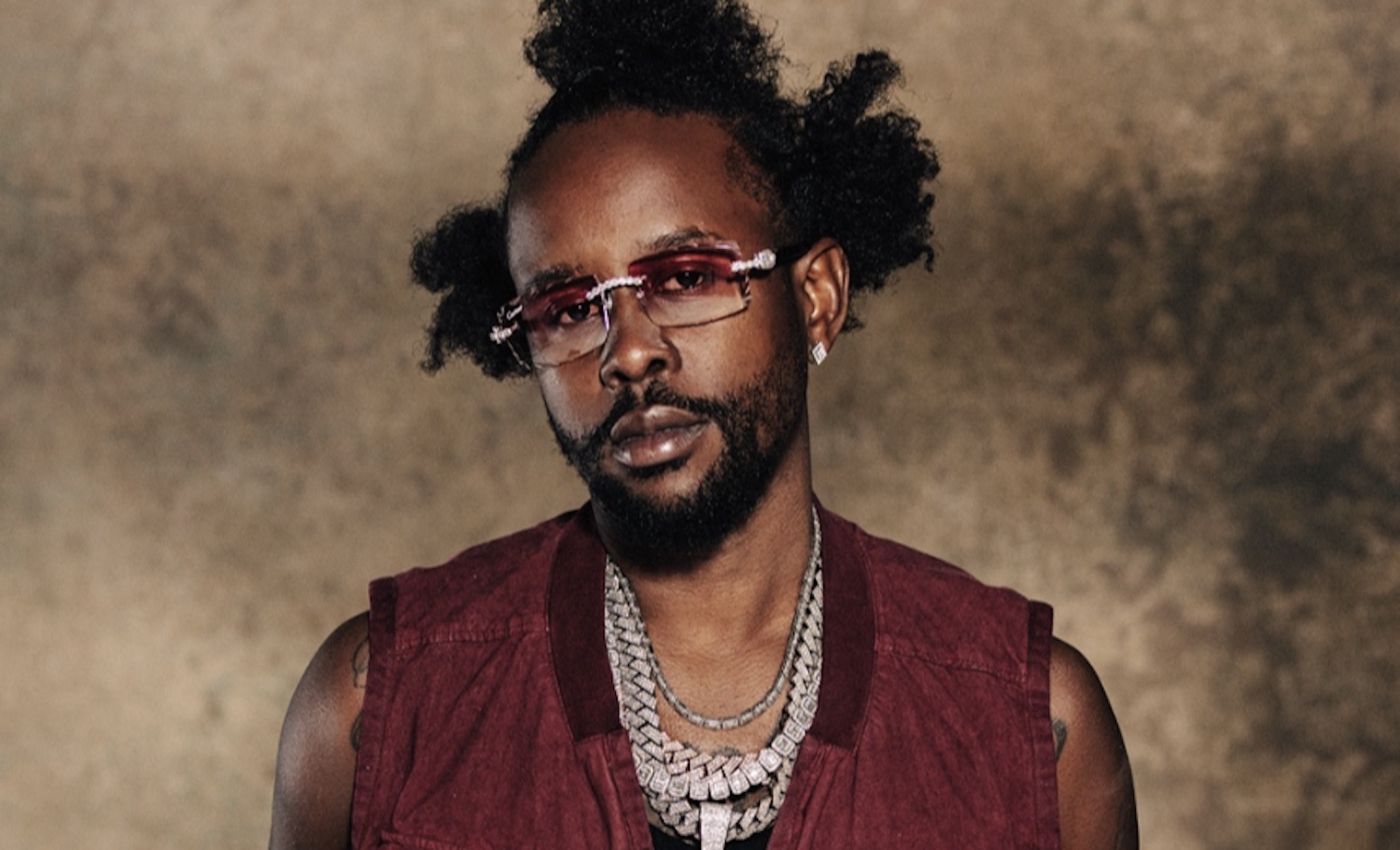 Popcaan red gilet chain