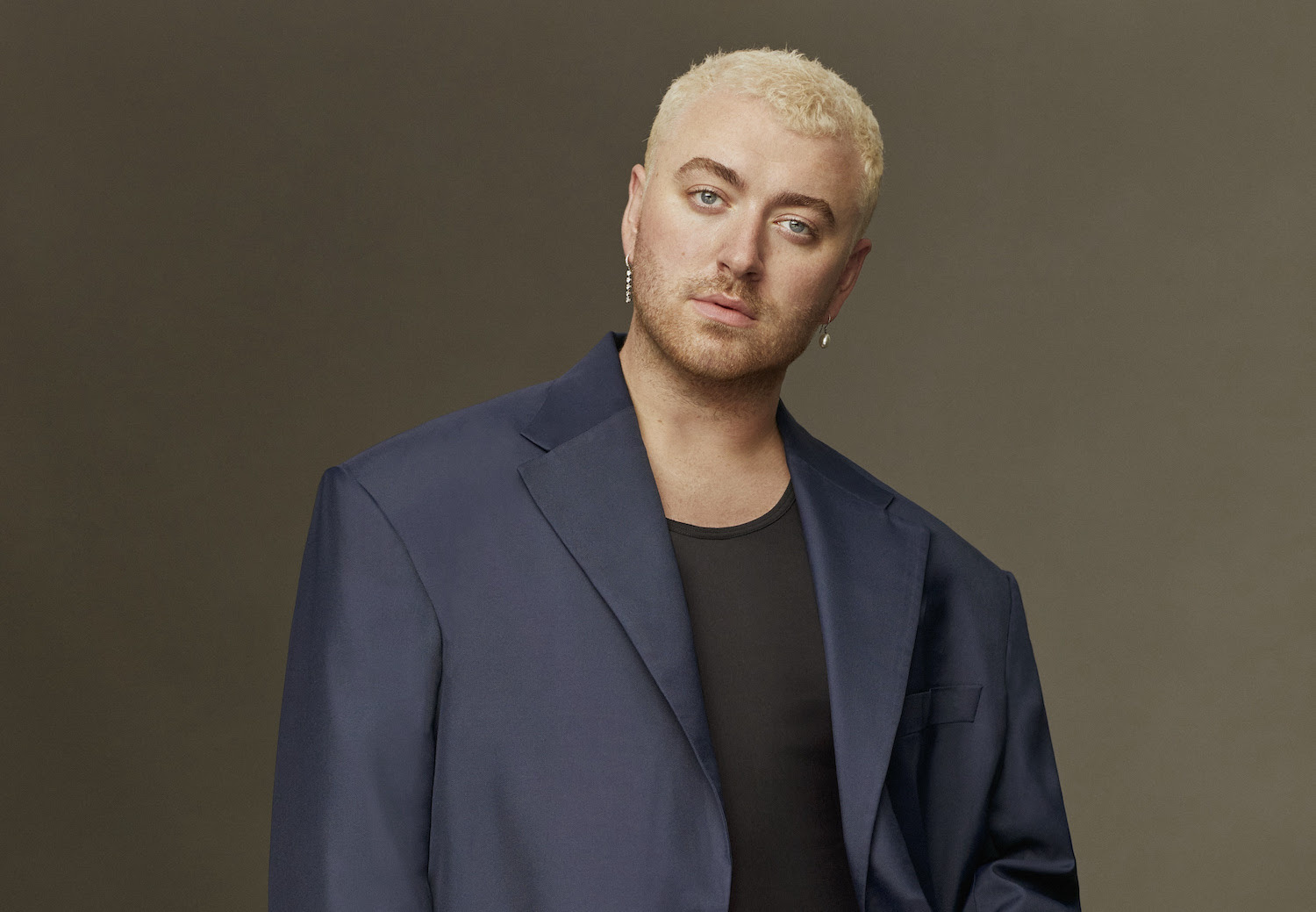 Sam Smith blue suit blonde hair