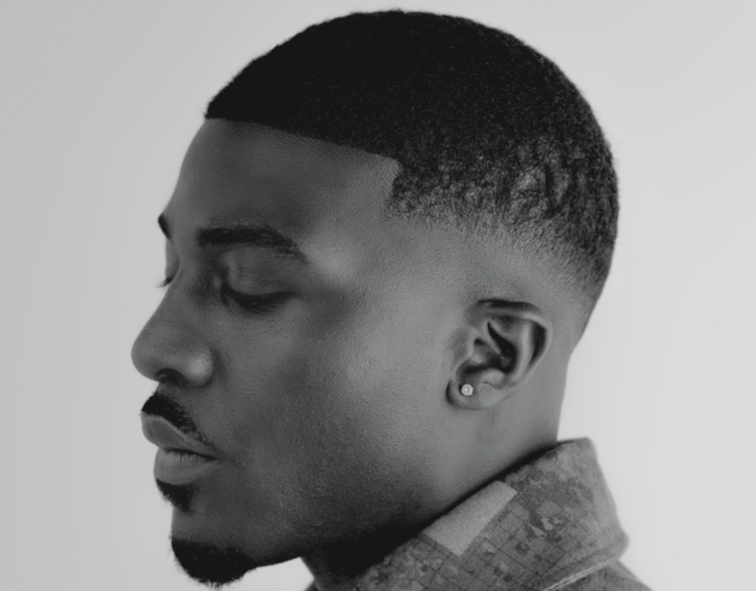 Scribz Riley side headshot monochrome