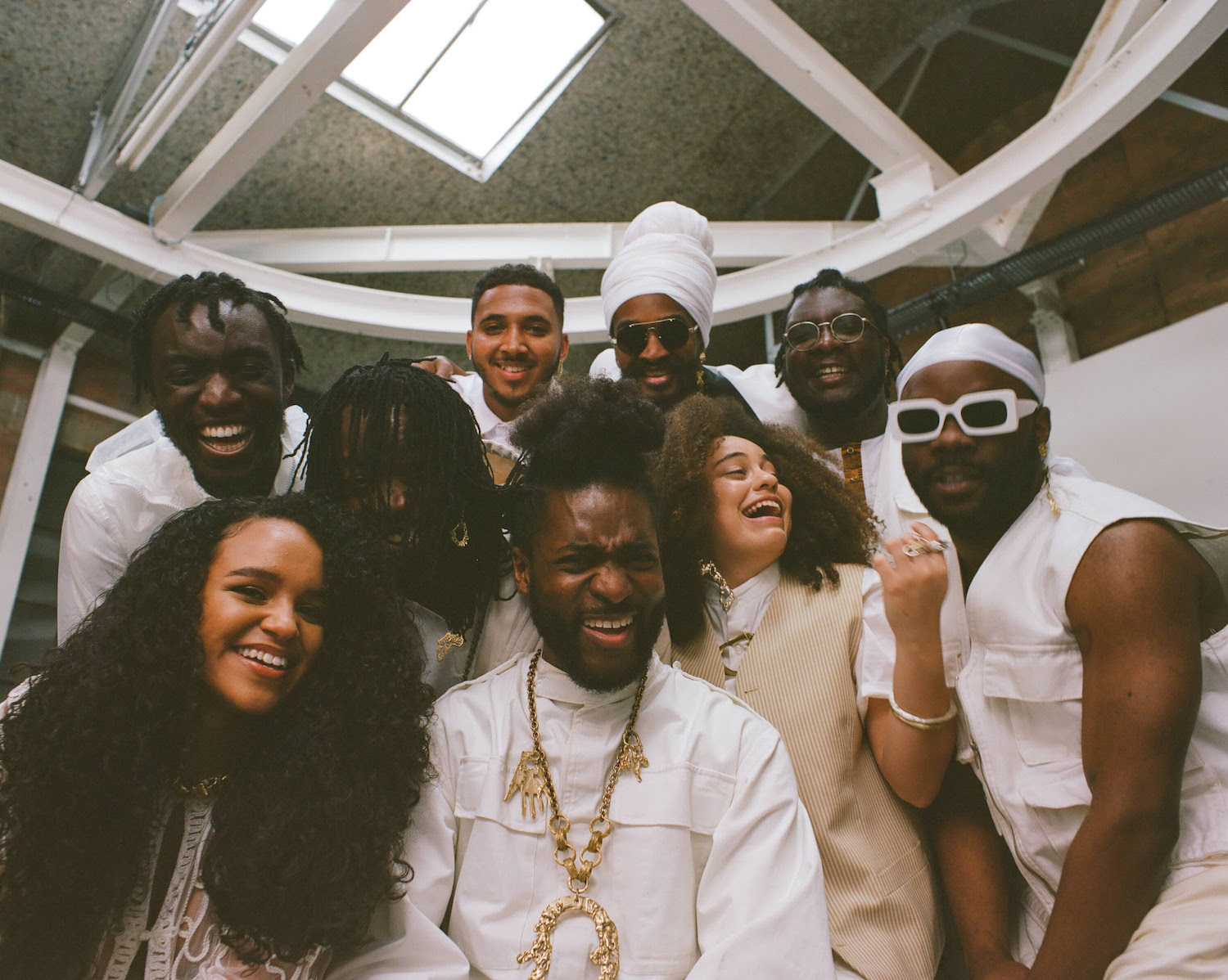 Steam Down group shot smiling white clothing