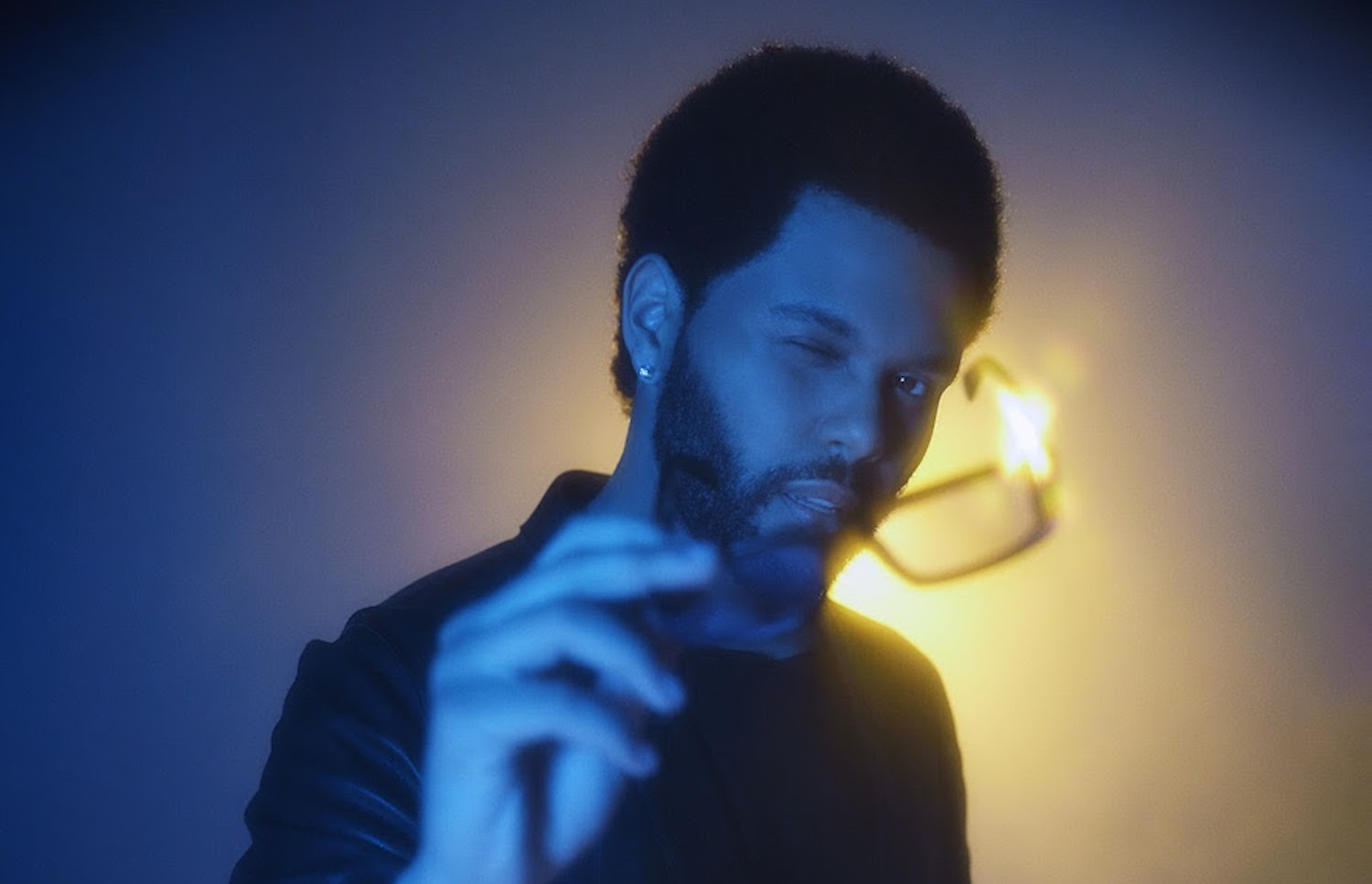 The Weeknd blue gold lighting golding glasses