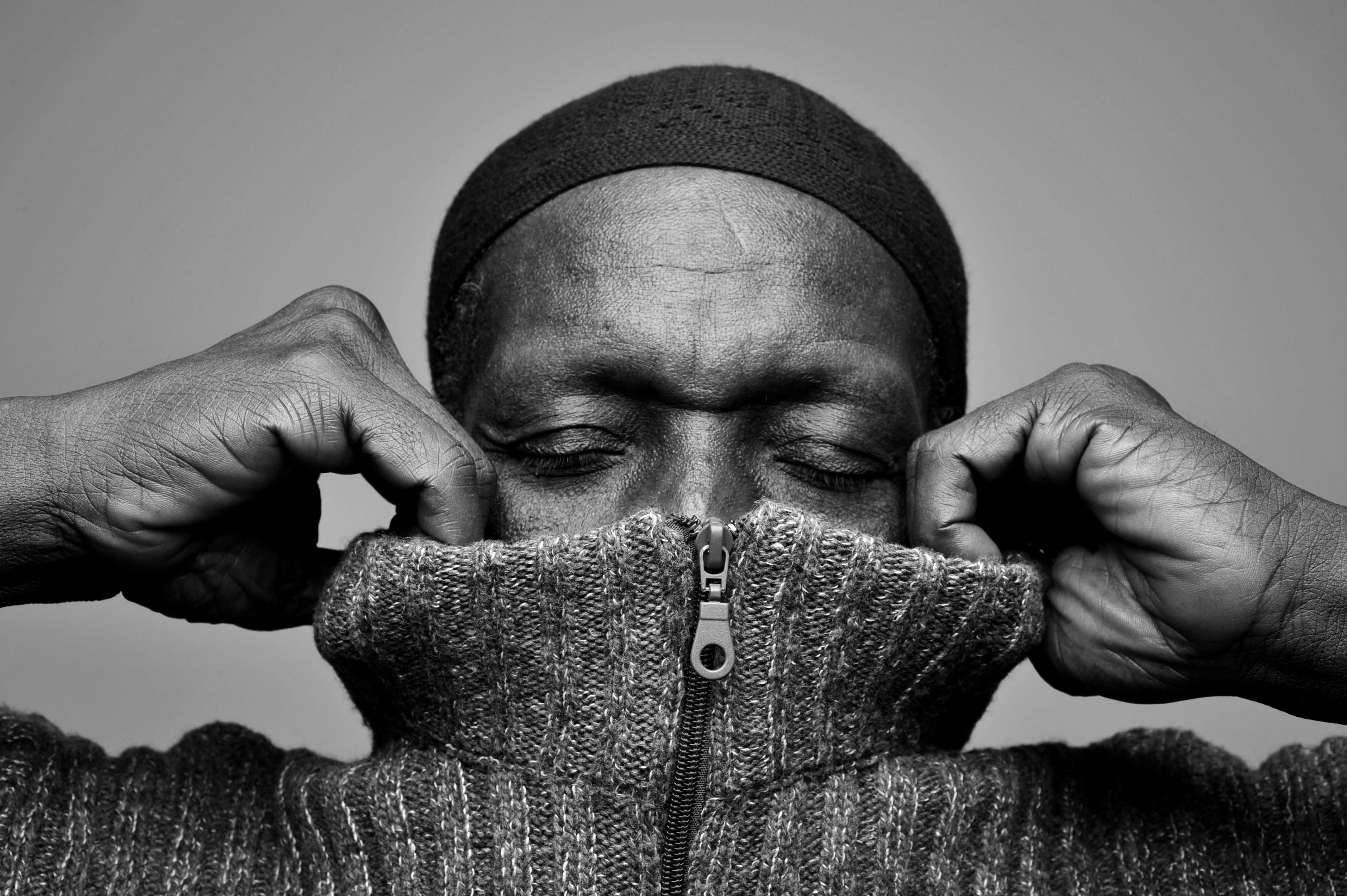 Tony Allen Bernard Benant pulling on sweater