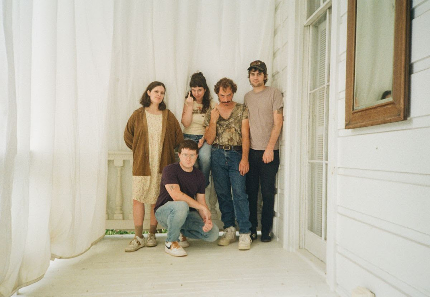 Wednesday balcony white sheet 2023
