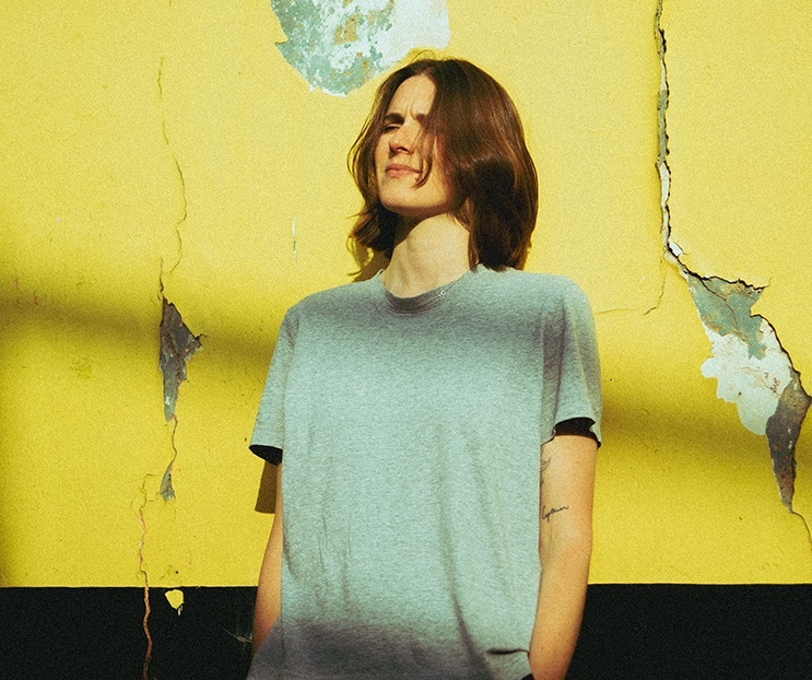 Art school girlfriend yellow wall 2023