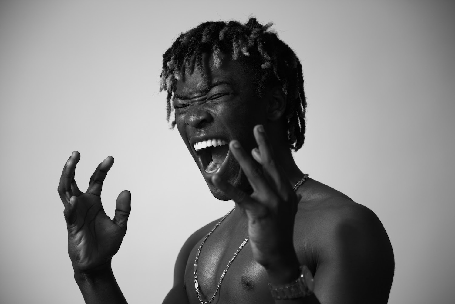 Merlyn Wood screaming in monochrome