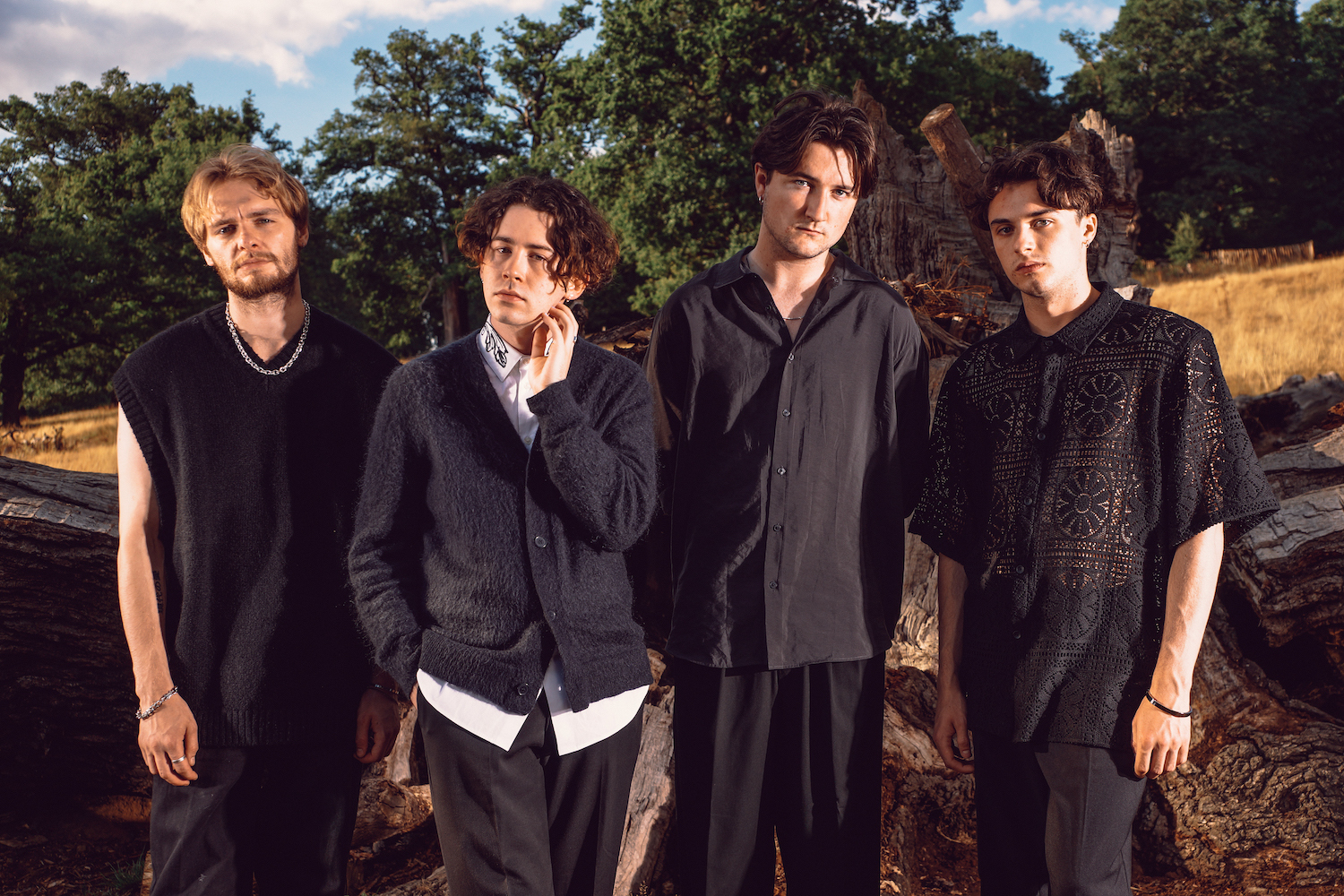 Modernlove band shot black outfits outdoors